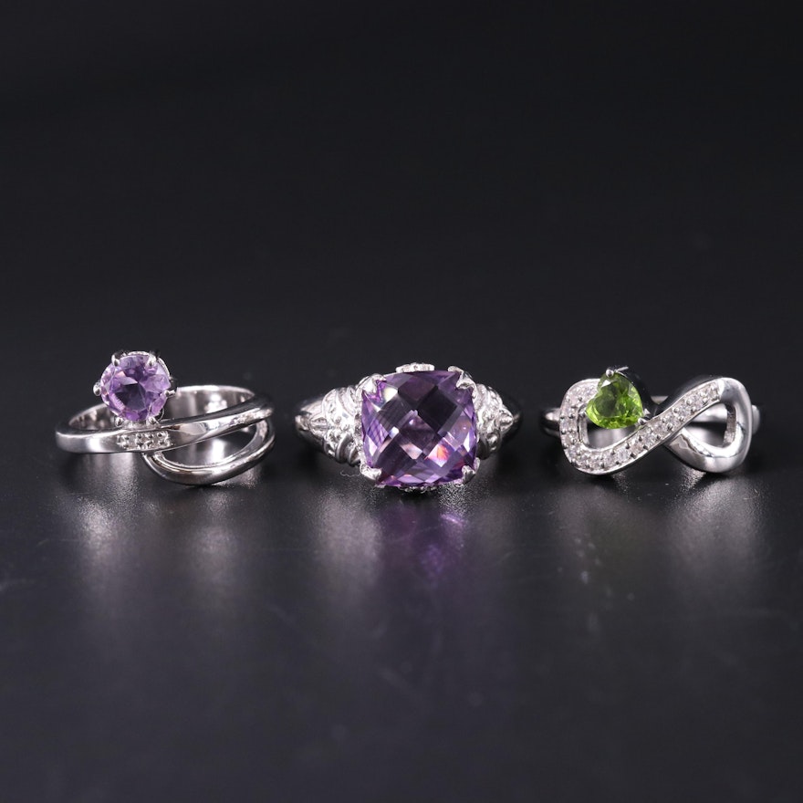 Sterling Silver Ring Trio Including Diamond, Peridot, and Amethyst