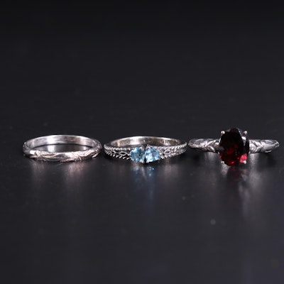 Sterling Silver Ring Trio Including Garnet and Topaz