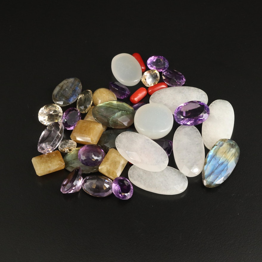 Loose Gemstones Including Labradorite and Coral