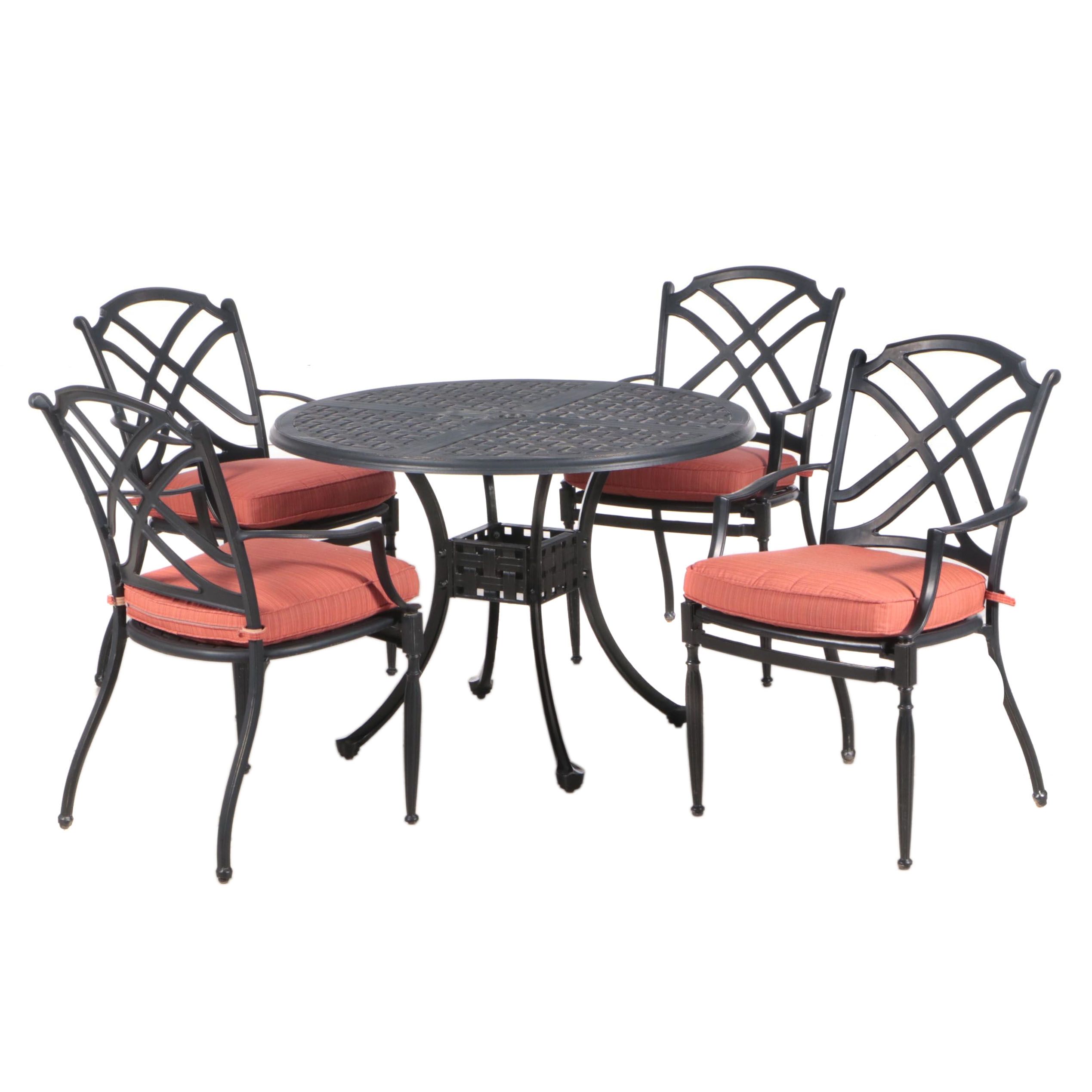 Cast Aluminum Patio Table and Four Armchairs with Seat Cushions EBTH