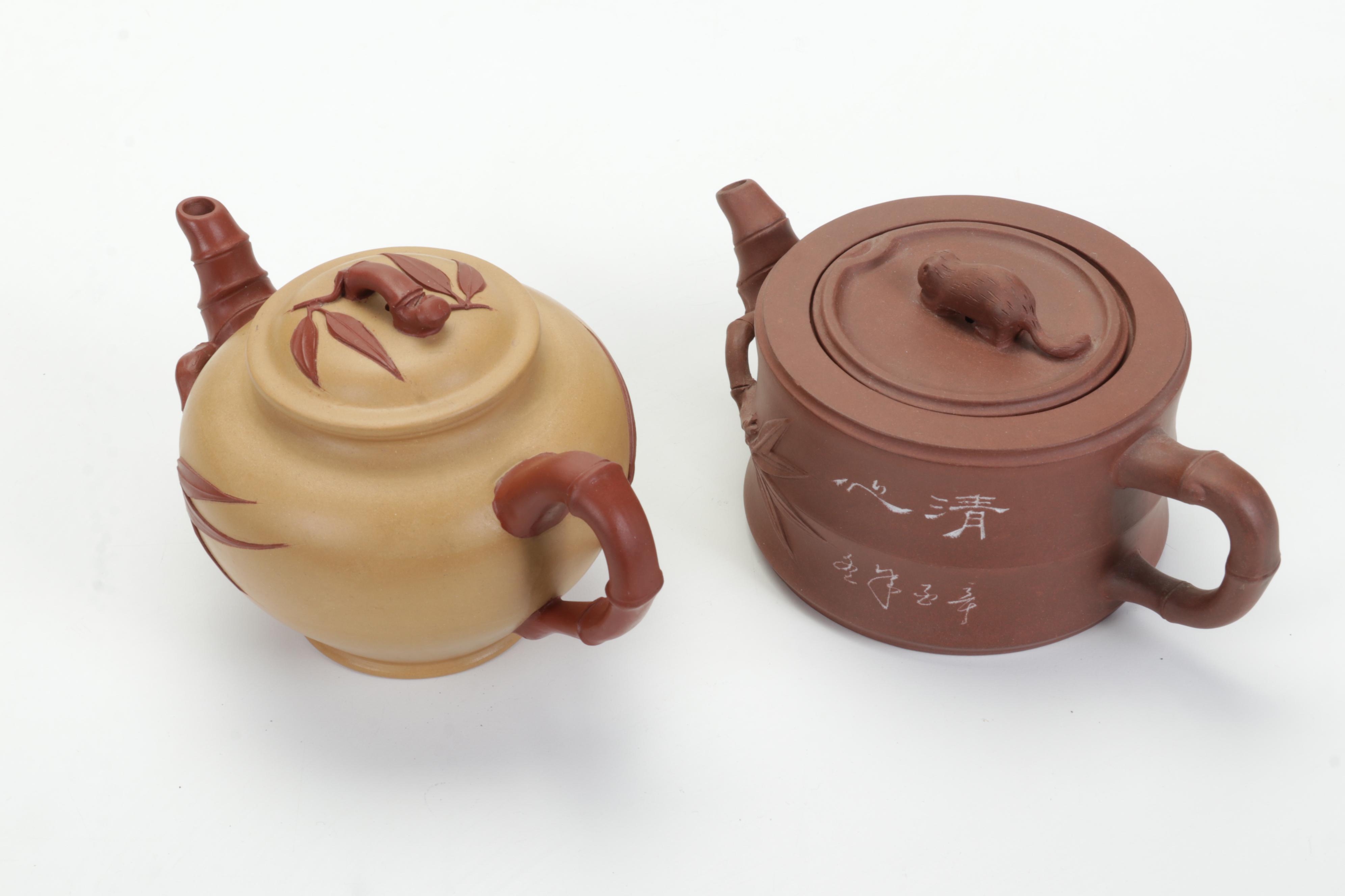 Chinese Yixing Pottery Teapots with Tang Style Horses and Other Buddha