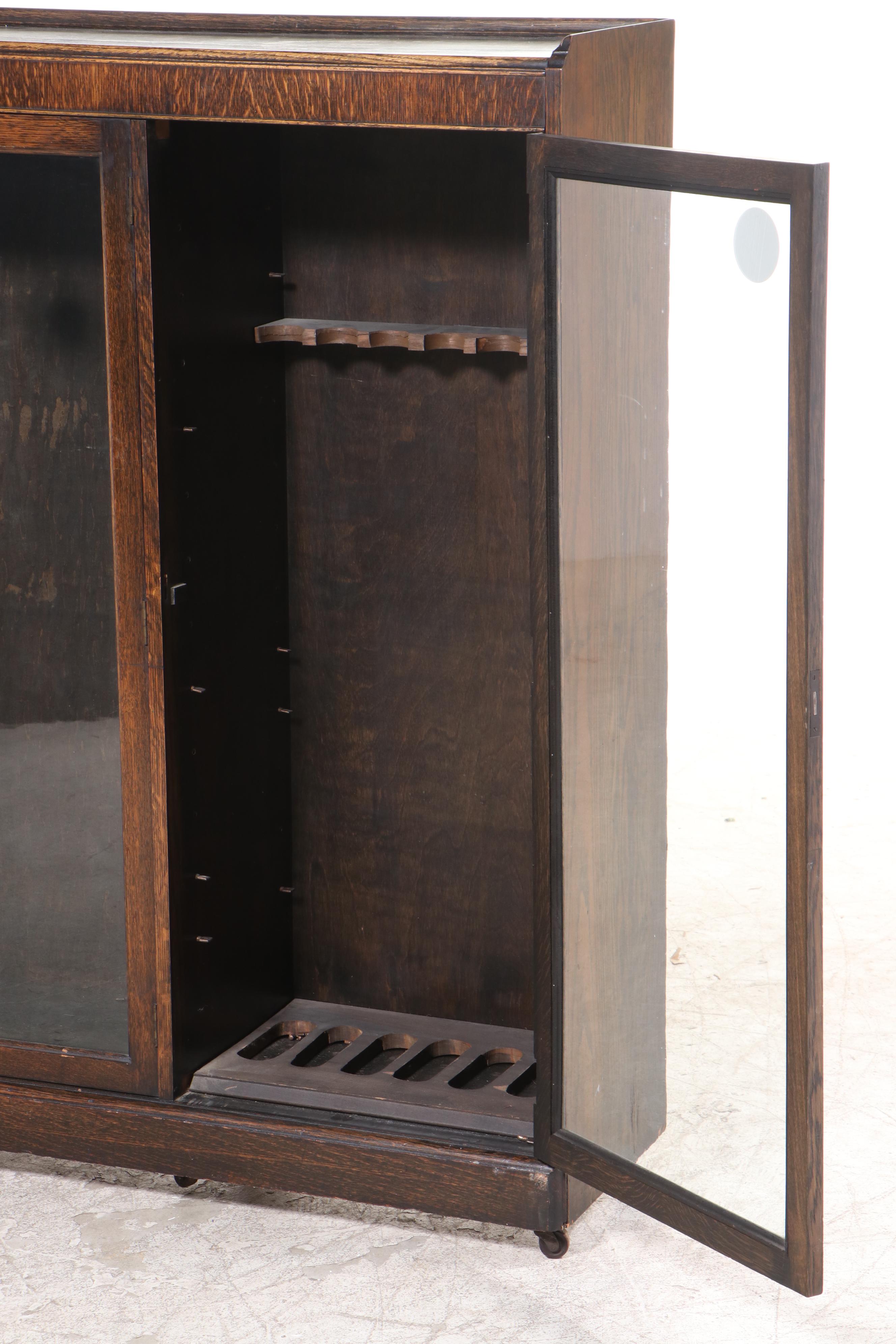 Late Victorian Oak Bookcase/Gun EBTH