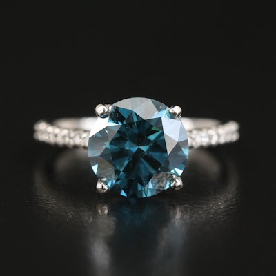 14K 3.81 CTW Diamond Ring with a Fancy Dark Blue Center Diamond