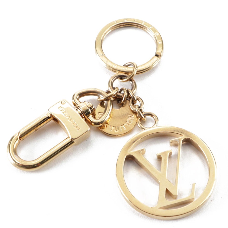 Louis Vuitton Logo Key Chain/Charm in Gold-Tone Metal