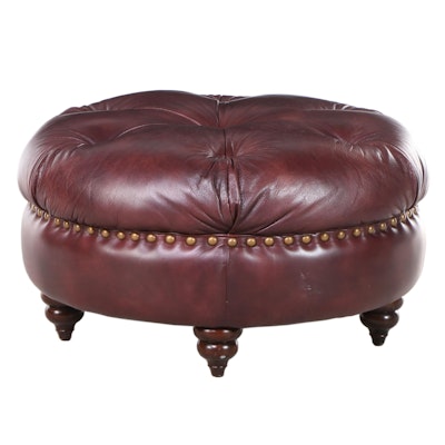 Round Tufted Leather Ottoman on Turned Feet