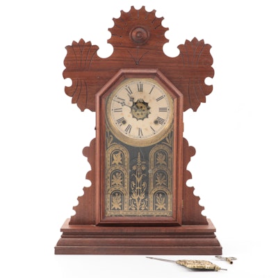 Waterbury Clock Co. Walnut Cased Gingerbread Mantel Clock, 20th Century