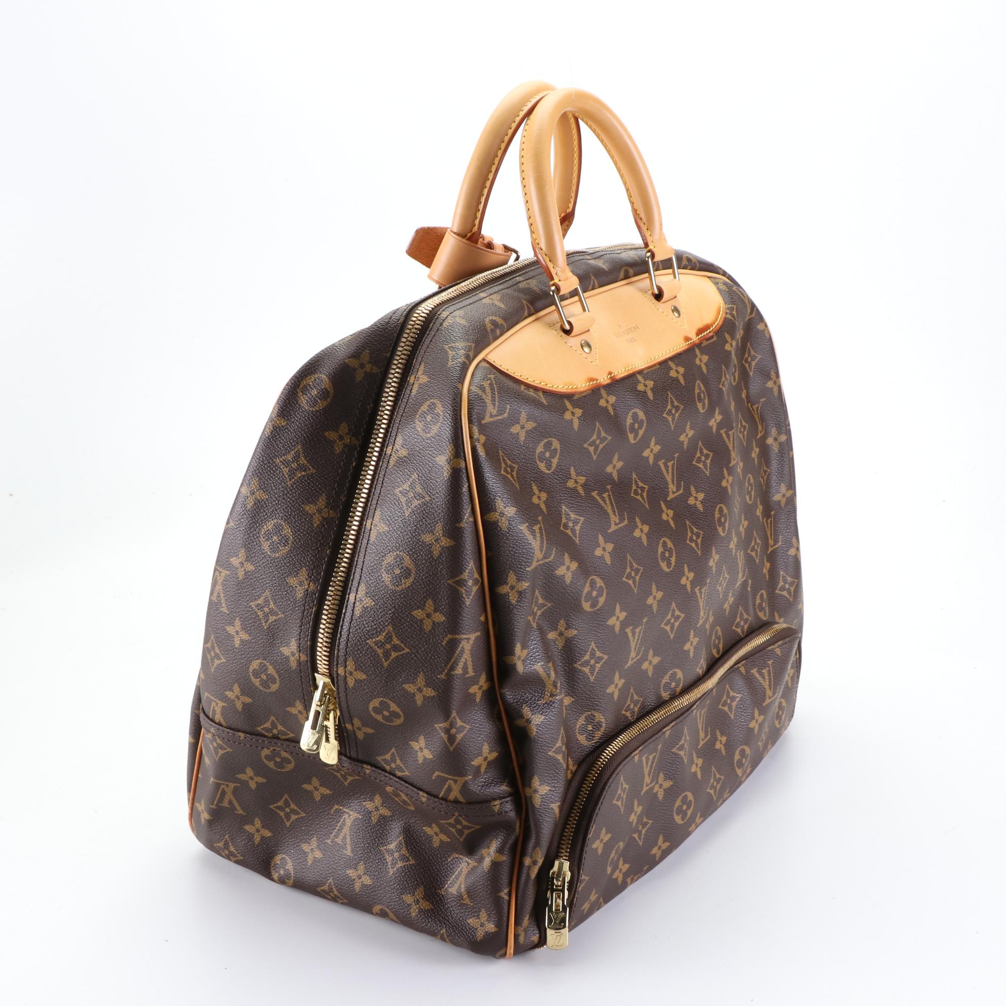 Louis Vuitton Evasion Travel Bag in Monogram Canvas and Vachetta