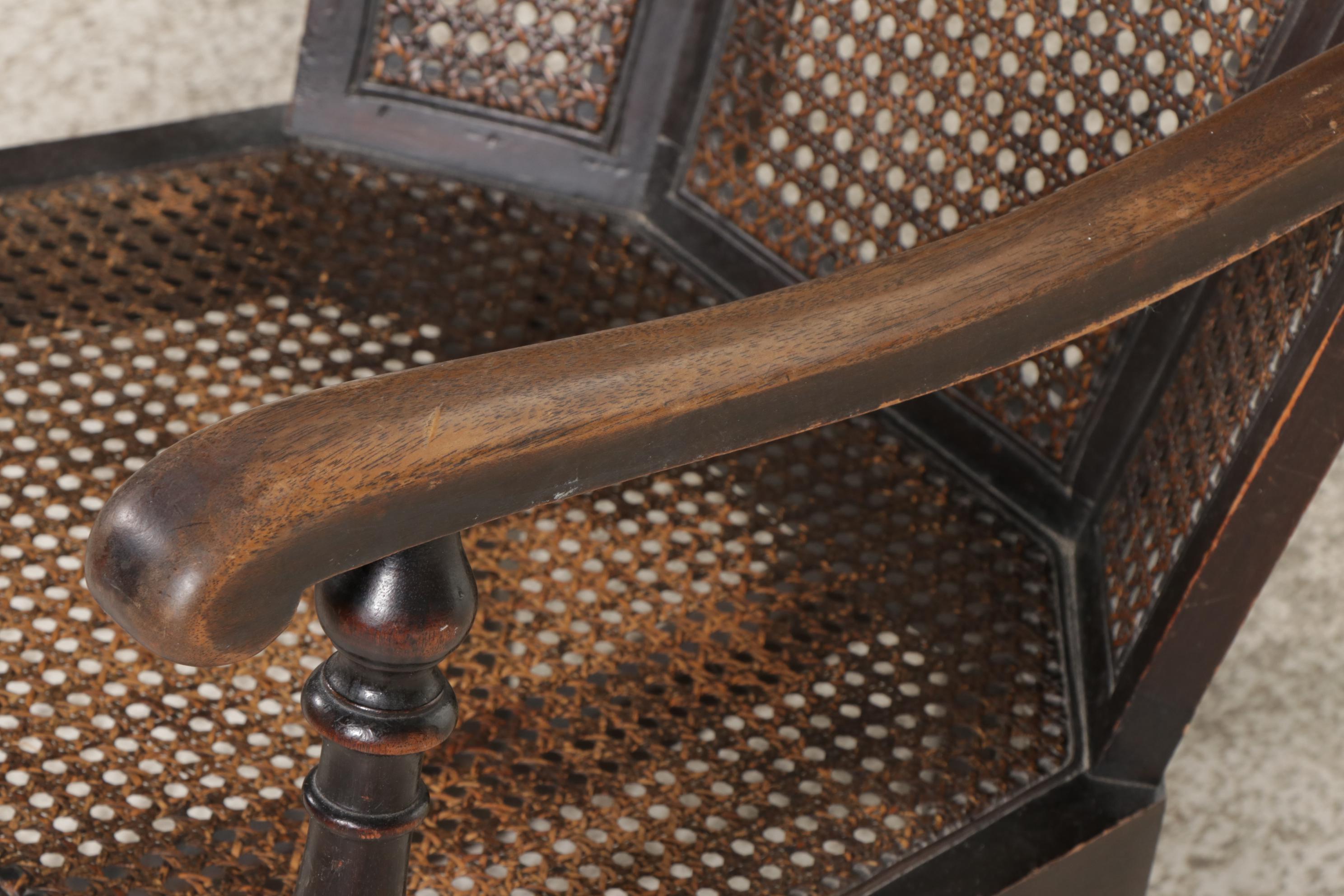 Queen Anne Style Ebonized and Caned Wingback Rocking Armchair EBTH