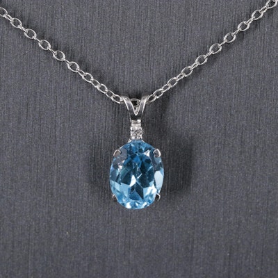 Sterling Silver Pendant Necklace Featuring Topaz