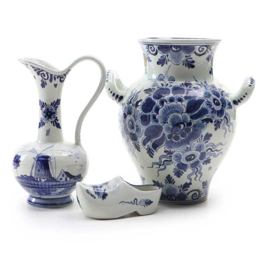 Regina with Other Delft Blue and White Vase, Pitcher and Shoe Figurine