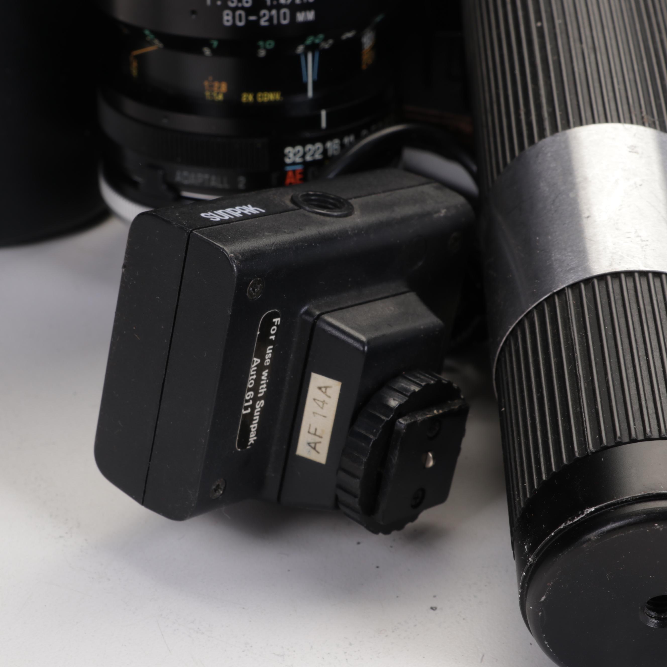 Canon AE1 Camera with Lenses, Flashes and Other Accessories EBTH