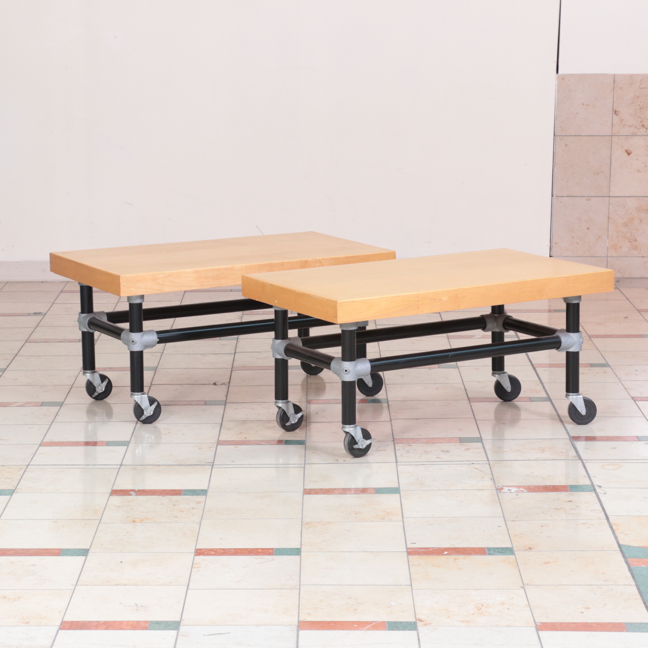 Three Metal and WoodVeneered Top Rolling Retail Display Tables EBTH