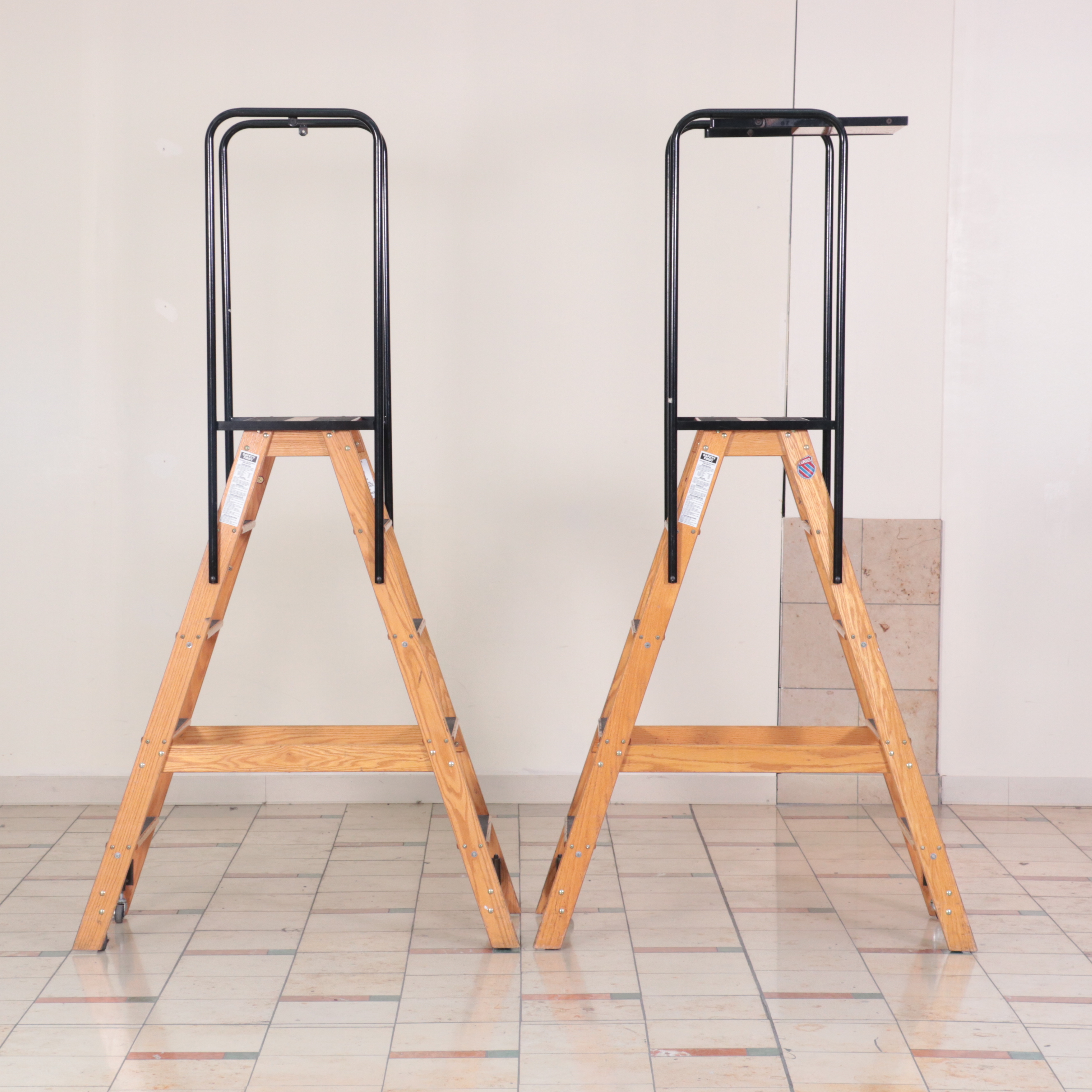 Pair of Putnam Finished Wood and Metal Rolling Ladders EBTH