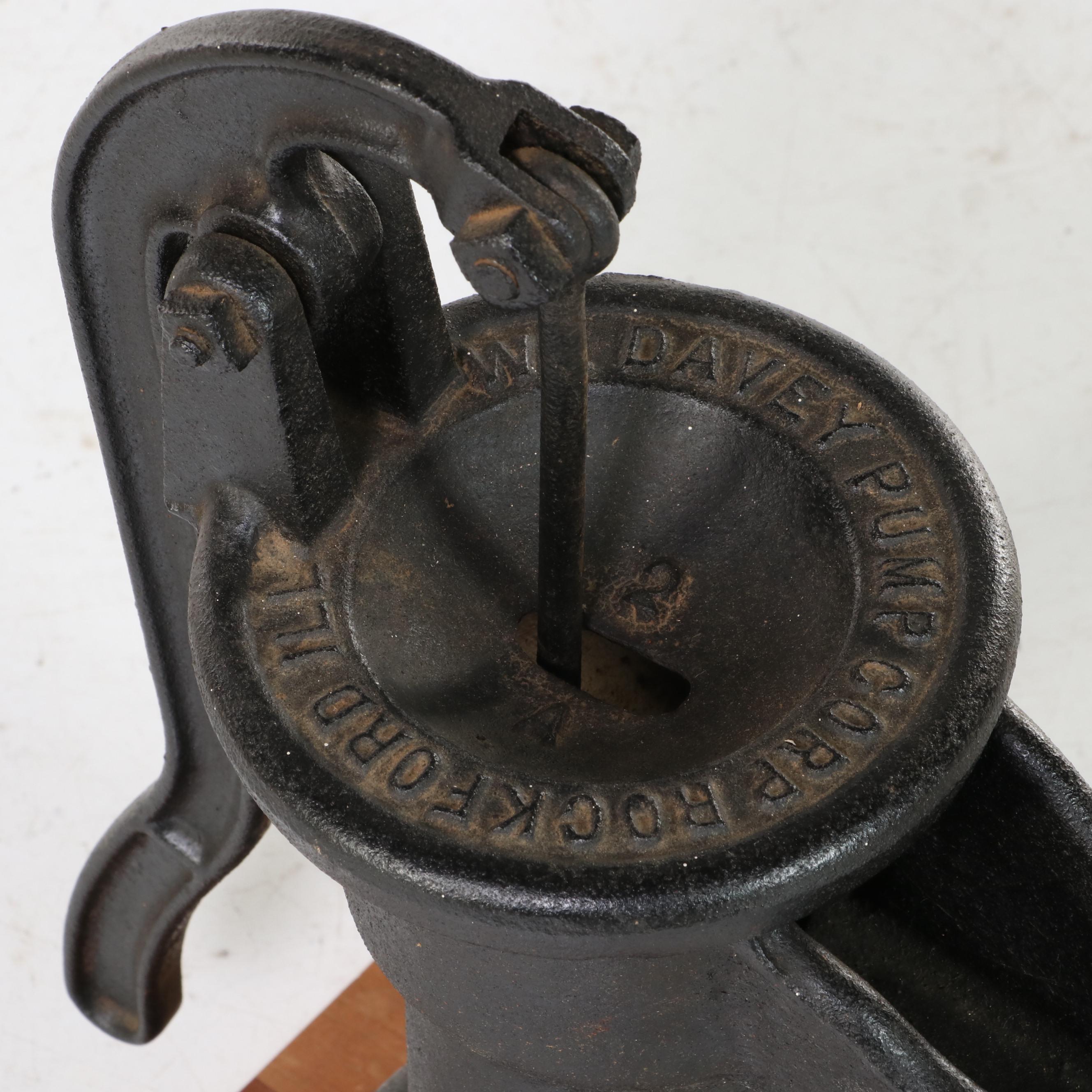 W.L. Davey Pump Corp. Cast Iron Water Hand Pump on Later Cherrywood