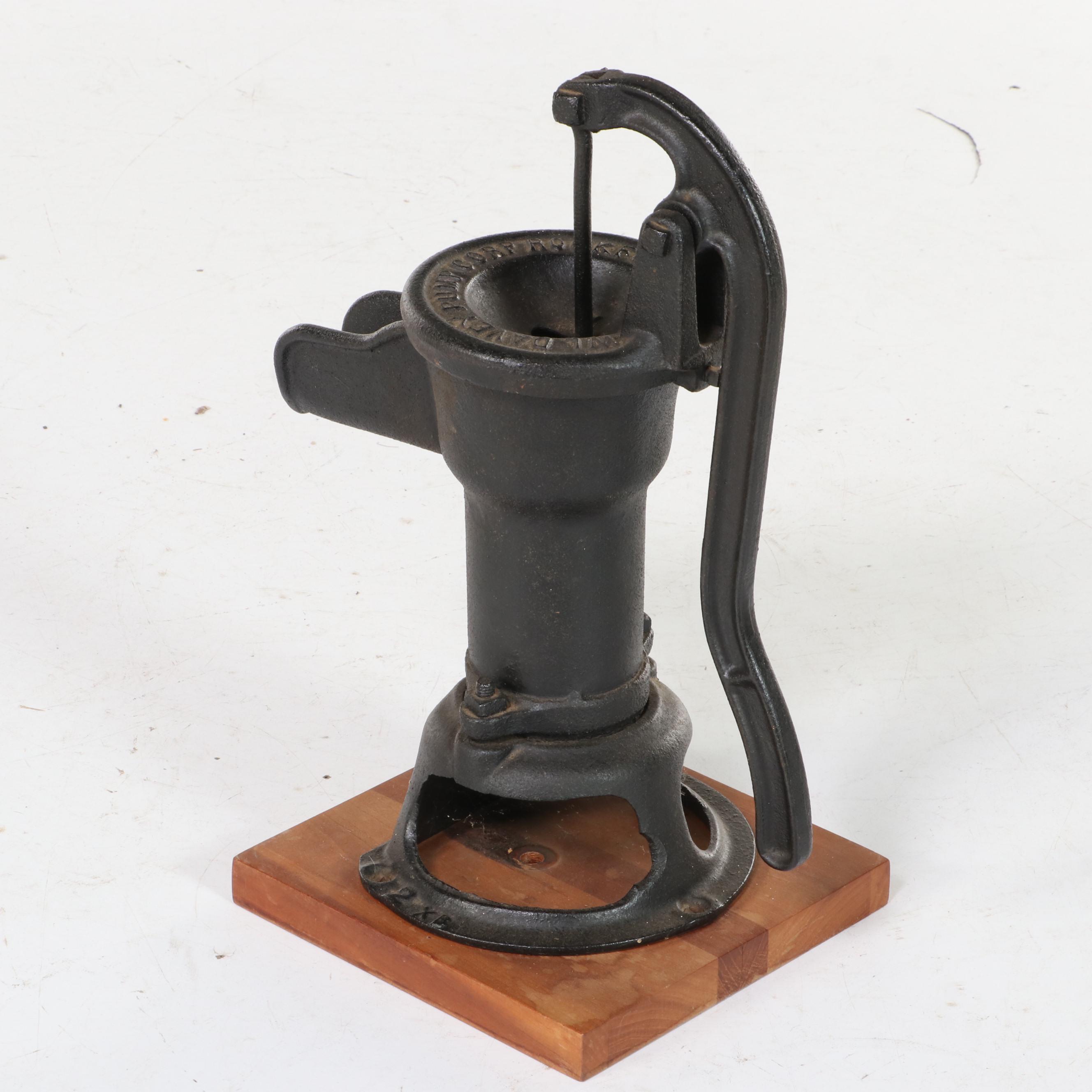 W.L. Davey Pump Corp. Cast Iron Water Hand Pump on Later Cherrywood