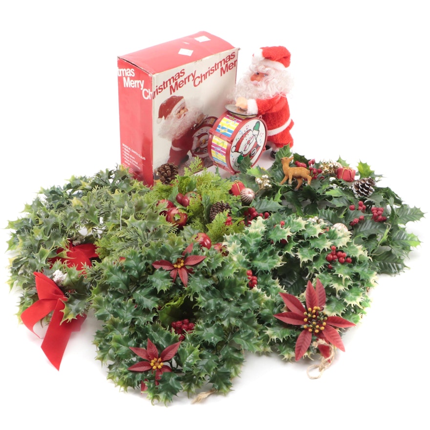 Musical Santa Claus with Plastic Wreaths
