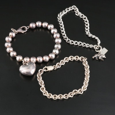 Milor and Bell Trading Post Charm Bracelets Featuring Sterling and 950 Silver