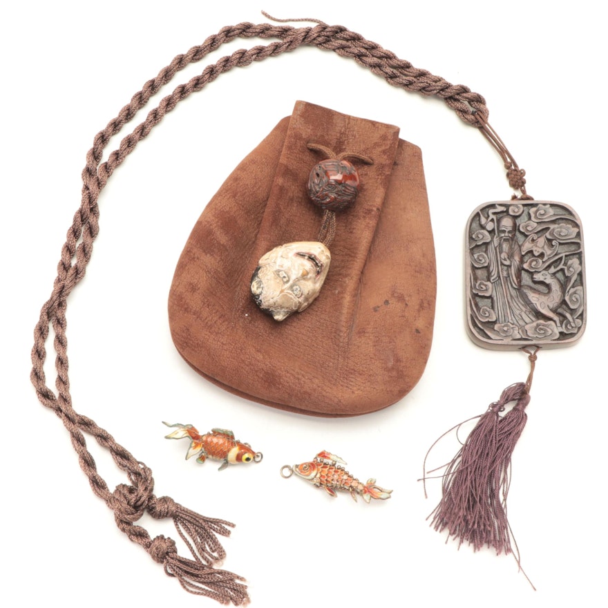 Japanese Leather Tobacco Pouch with Oni Netsuke, Chinese Medallion, and Pendants