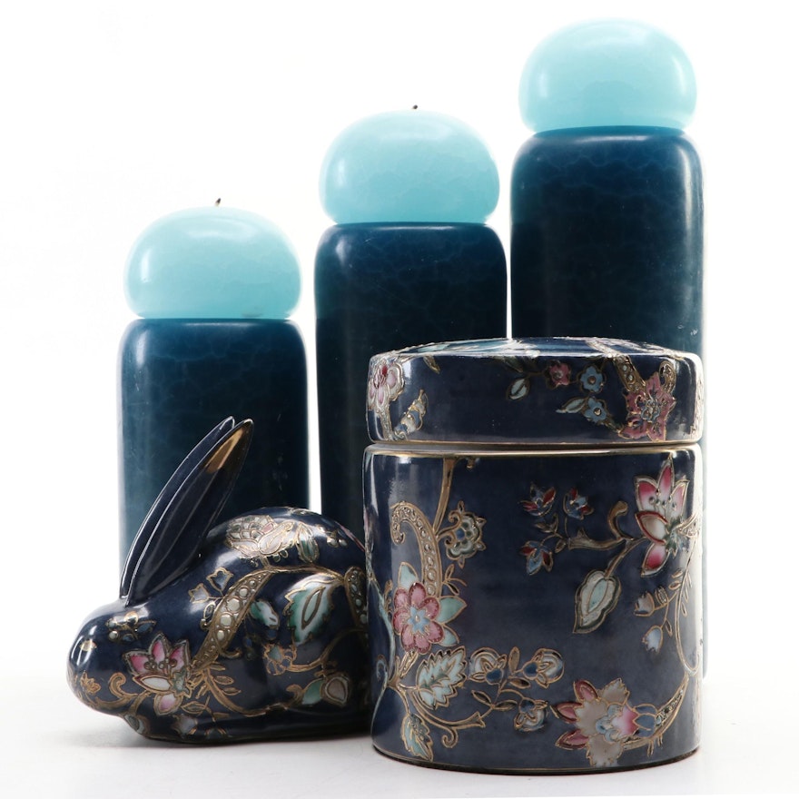 Hand-Decorated Floral Lidded Vessel and Rabbit Figurine with Blue Tiered Candles
