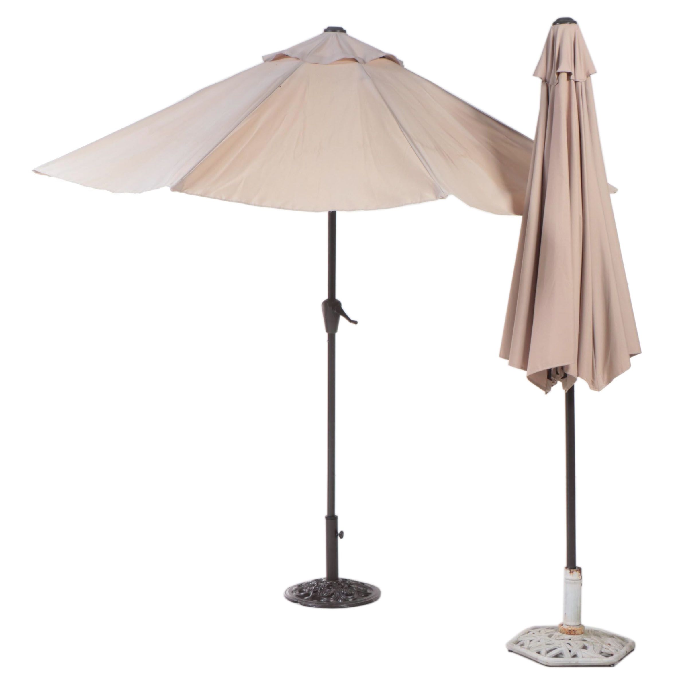 Two TiltCrank Patio Umbrellas with Cast Metal Stands EBTH