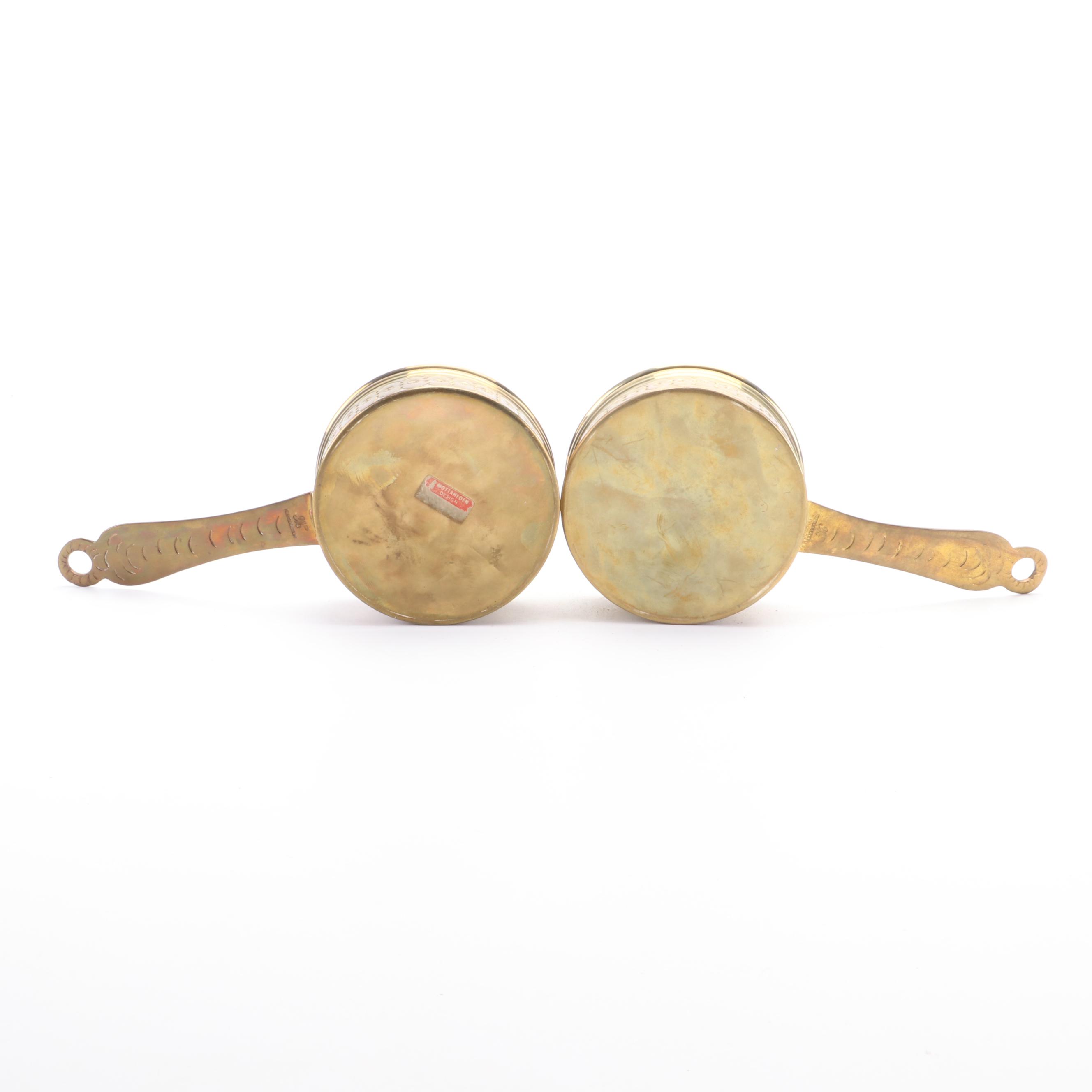 Mottahedeh Tinderbox Chamberstick with Other Brass Candlesticks and Ash