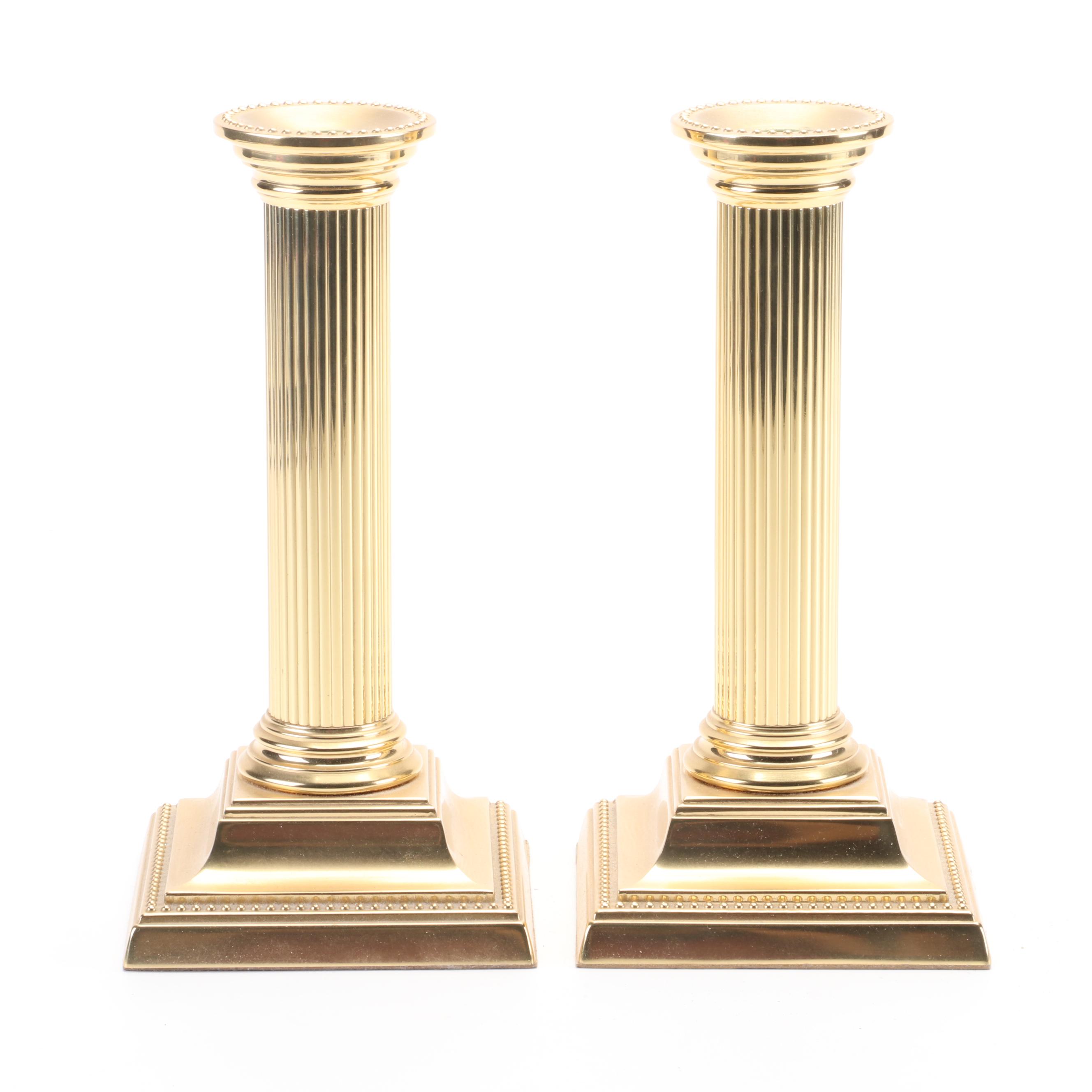 Mottahedeh Tinderbox Chamberstick with Other Brass Candlesticks and Ash