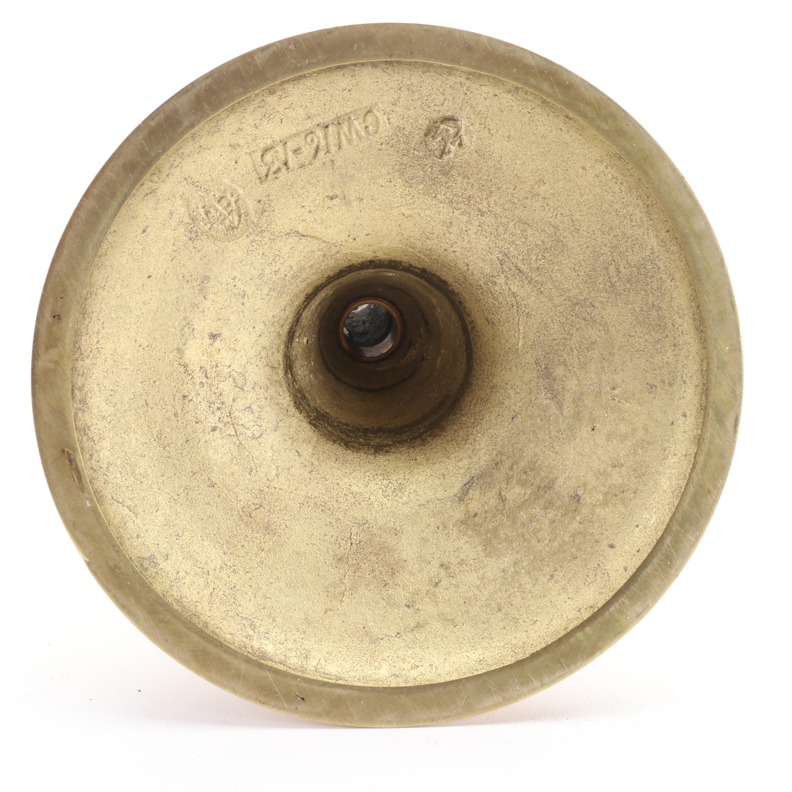 Mottahedeh Tinderbox Chamberstick with Other Brass Candlesticks and Ash