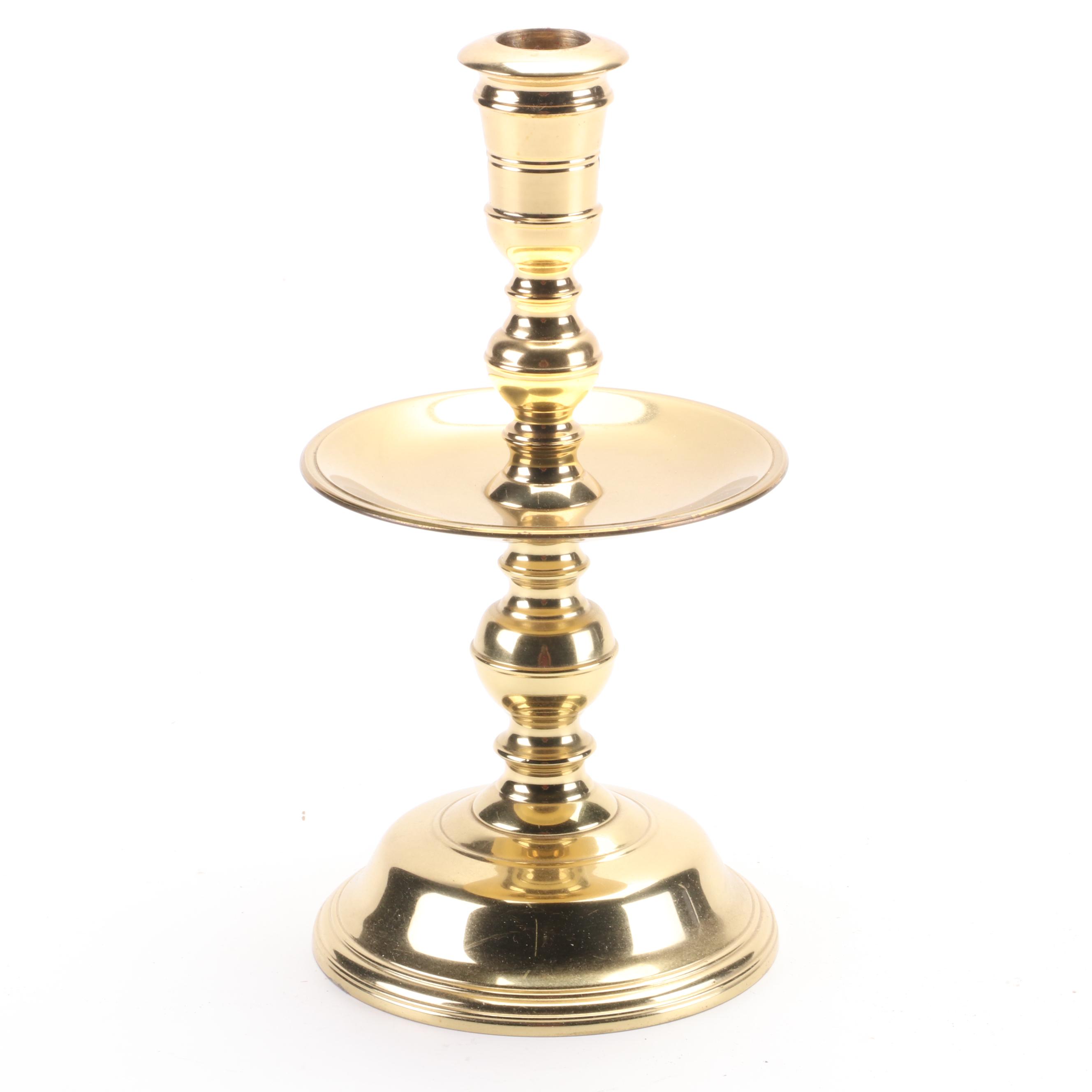 Mottahedeh Tinderbox Chamberstick with Other Brass Candlesticks and Ash