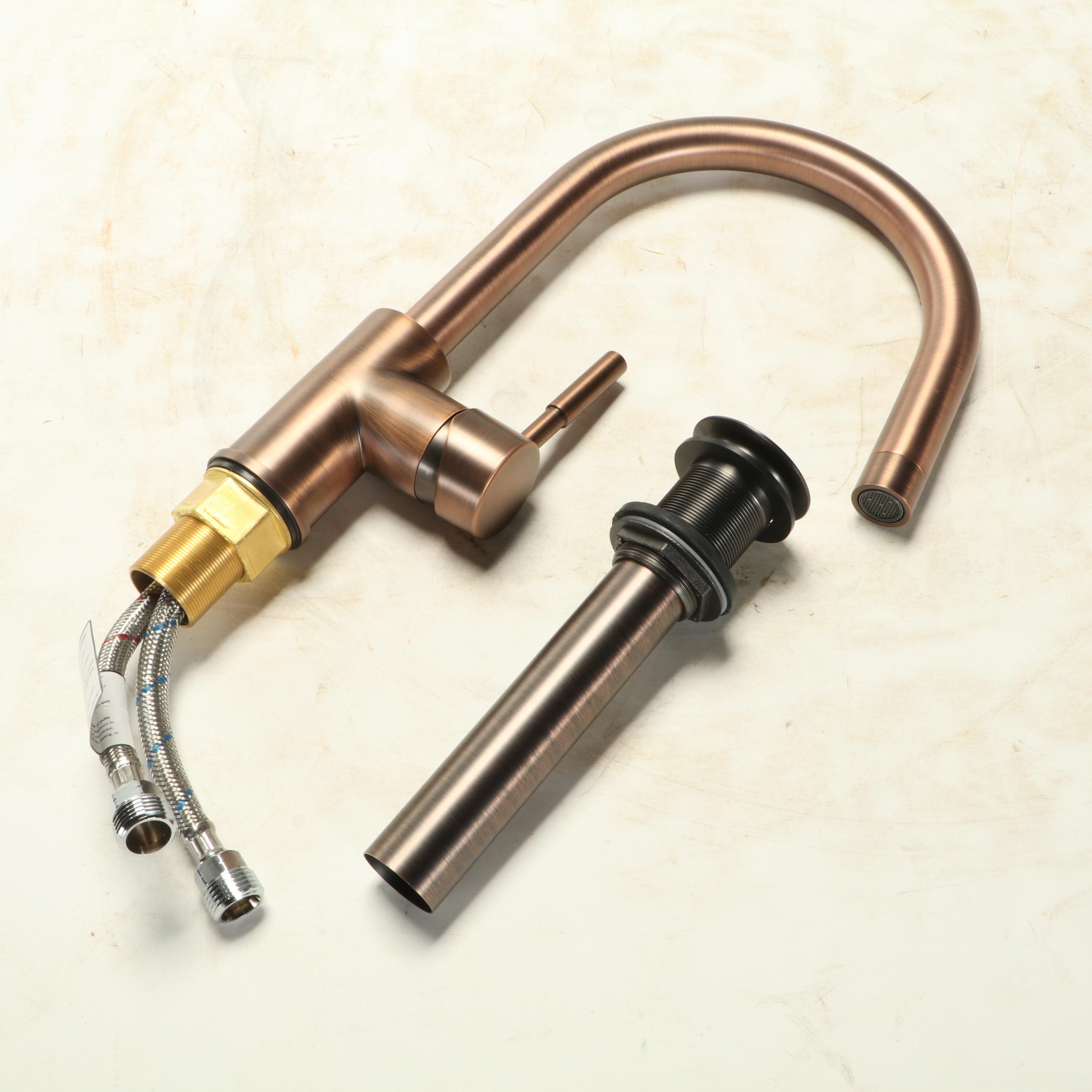 Porcelain Pedestal Sink with Oil Rubbed Bronze Faucet and PopUp Drain