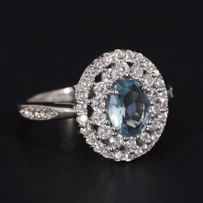 Sterling Aquamarine and Cubic Zirconia Halo Ring