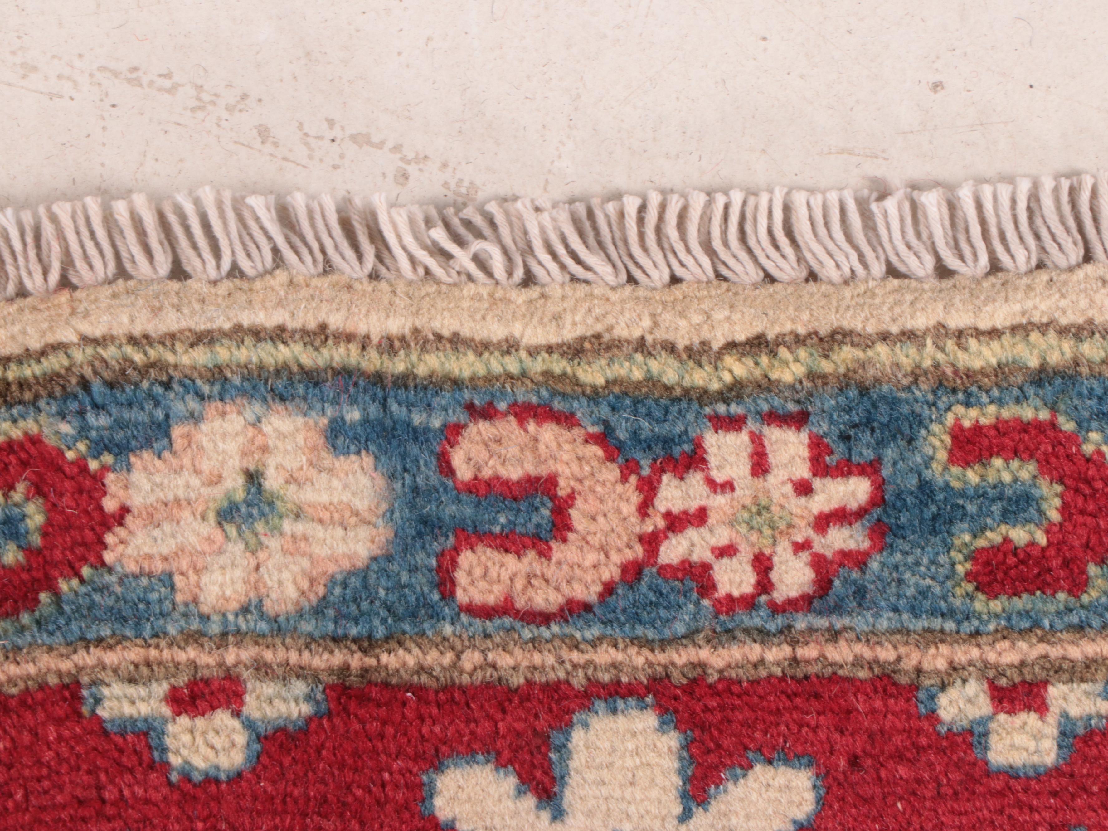6-6-x-9-7-hand-knotted-pakistani-kazak-style-area-rug-ebth