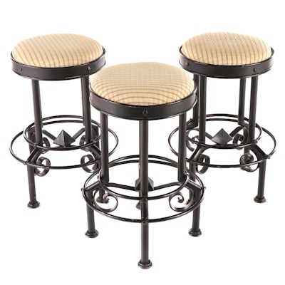 Three Metal and Custom-Upholstered Swivel Counter Stools