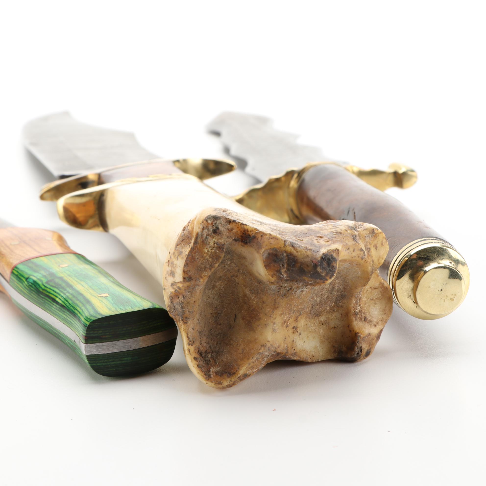 Three Different Damascus Steel, Wood, and Bone Handled Kris Knives and