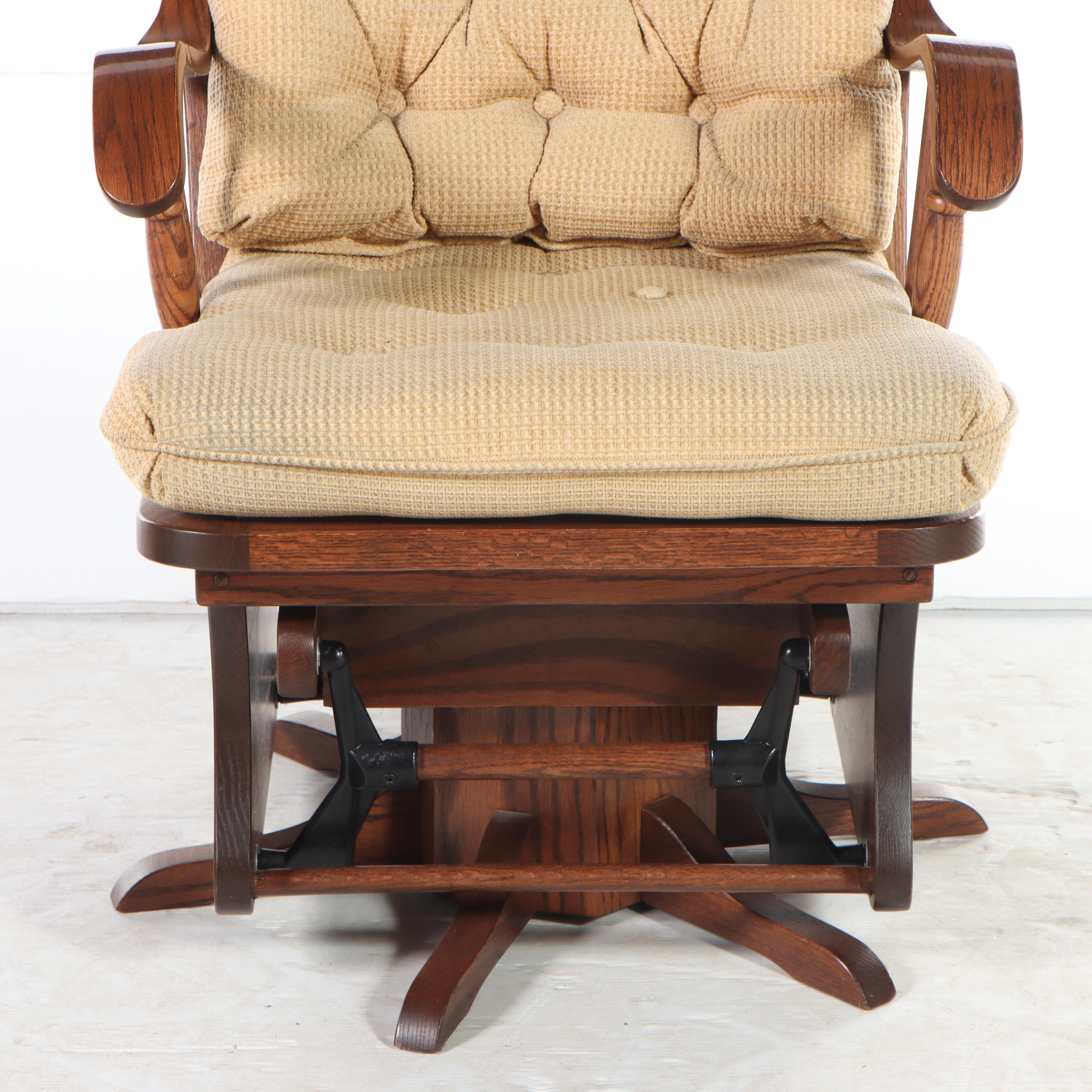 Elite Seating Oak SwivelGlider with Footstool, Late 20th Century EBTH