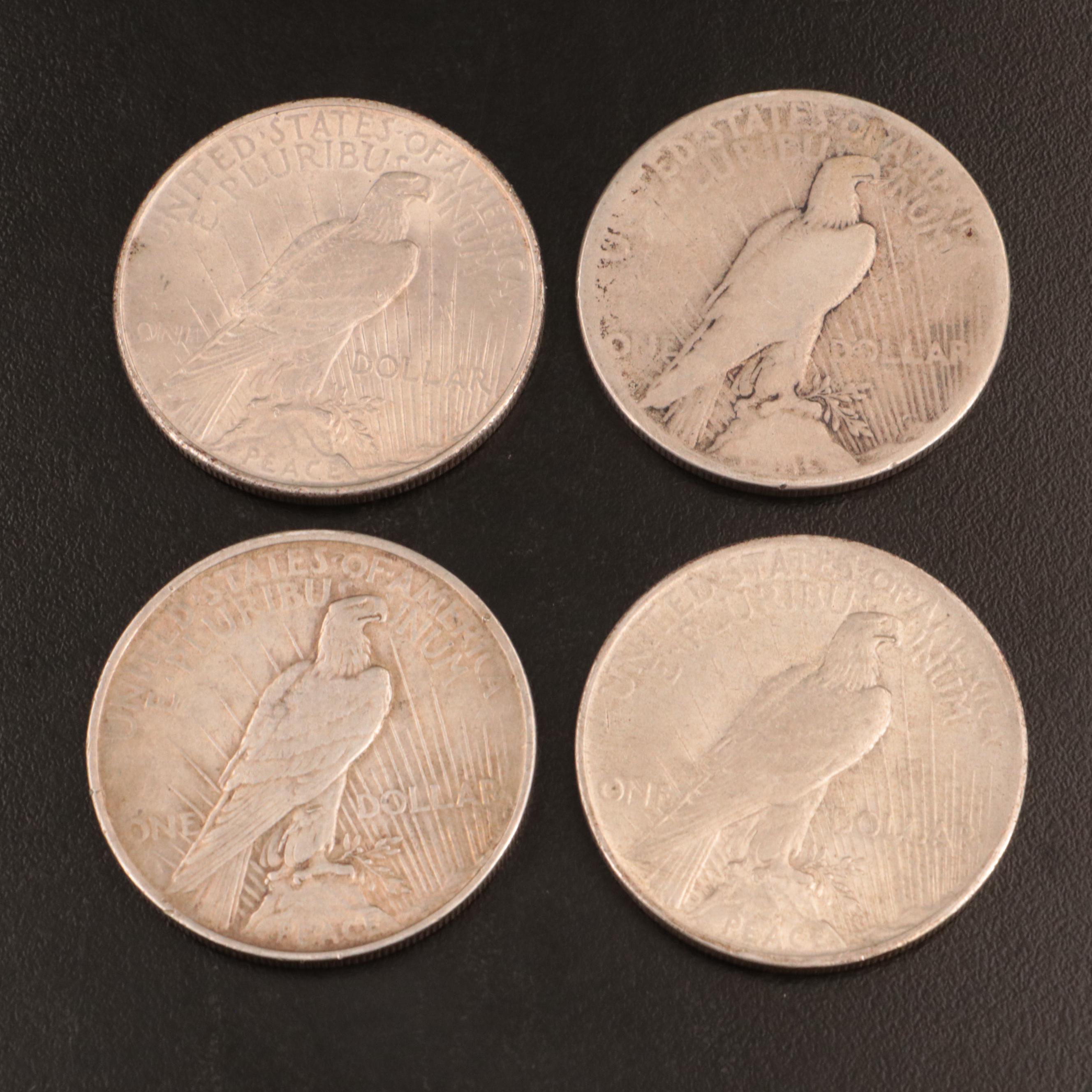 Five and Peace Silver Dollars EBTH