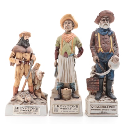 Lionstone and Cyrus Noble Mine Figural Porcelain Bisque Whiskey Decanters