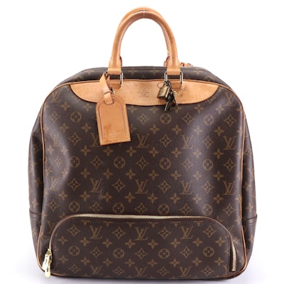 Louis Vuitton Evasion MM Travel Bag in Monogram Canvas and Vachetta Leather