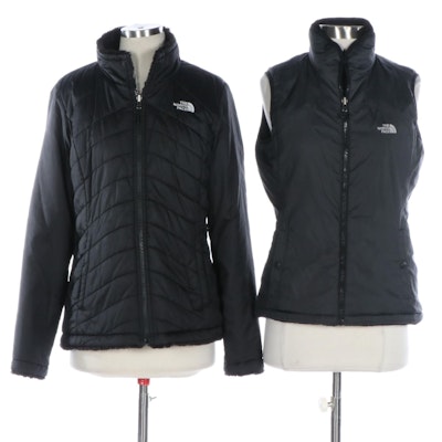 The North Face Reversible Vest and Coat in Nylon and Faux Shearling