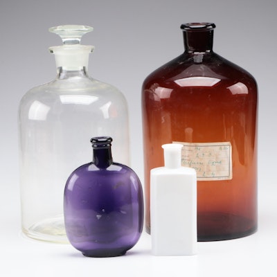 Amber Glass Apothecary and Other Colored Glass Bottles, 20th Century