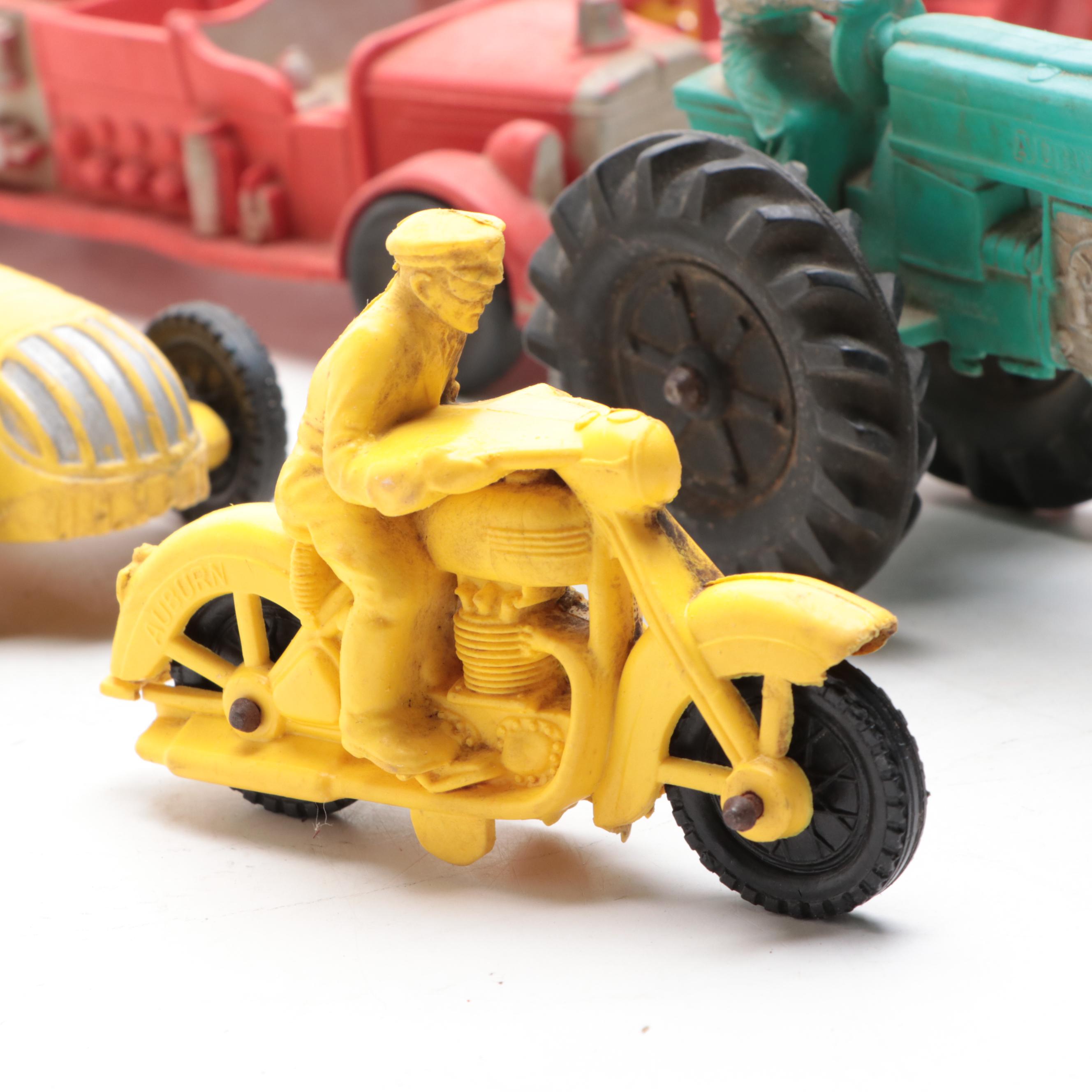 Auburn Rubber Co. Toy Motorcycles, Tractor, Firetruck and Race Car EBTH