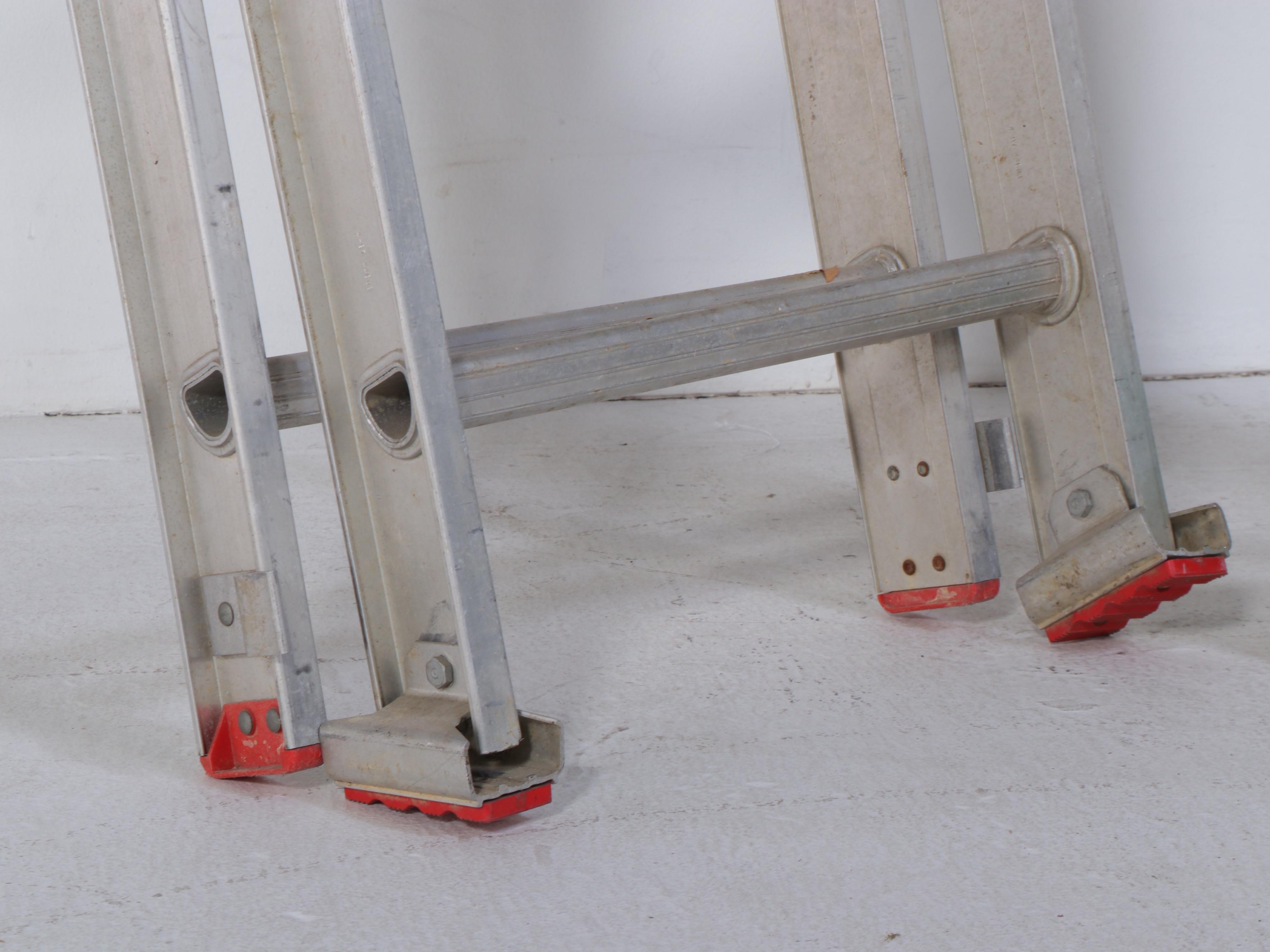 Werner and Keller Aluminum Extension Ladders With Louisville Step