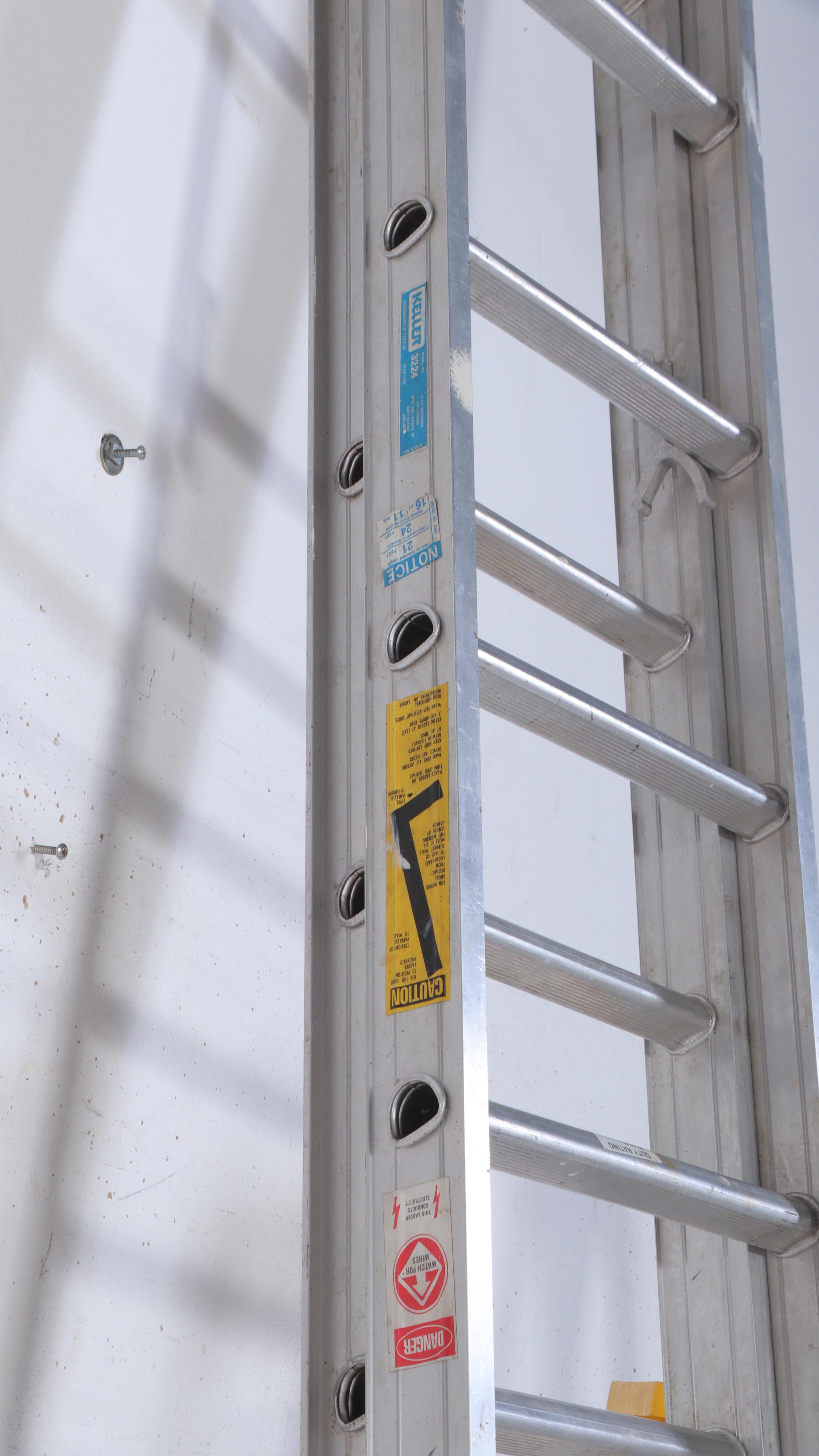 Werner and Keller Aluminum Extension Ladders With Louisville Step