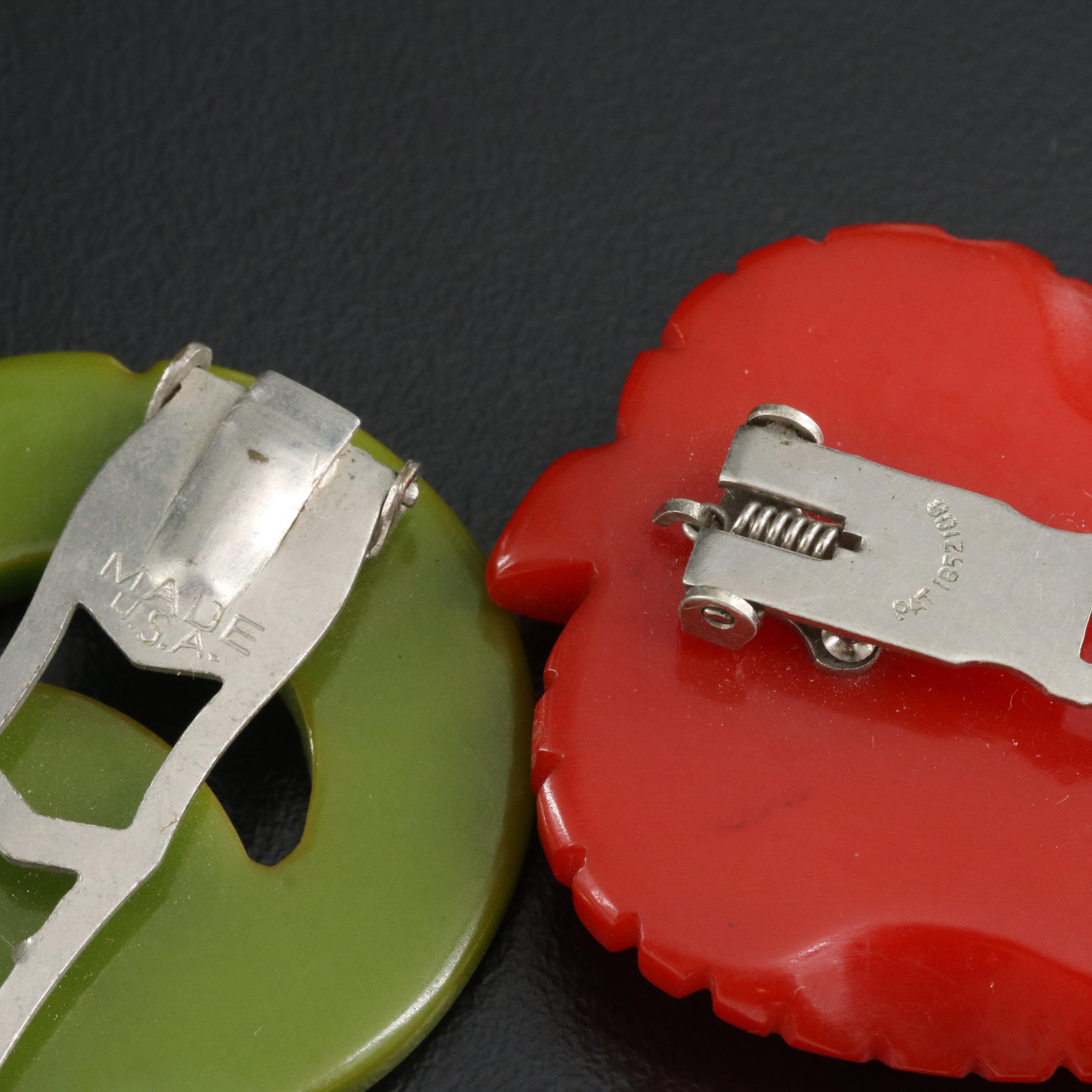 Vintage Carved Bakelite Brooches, Clips and Pendant EBTH