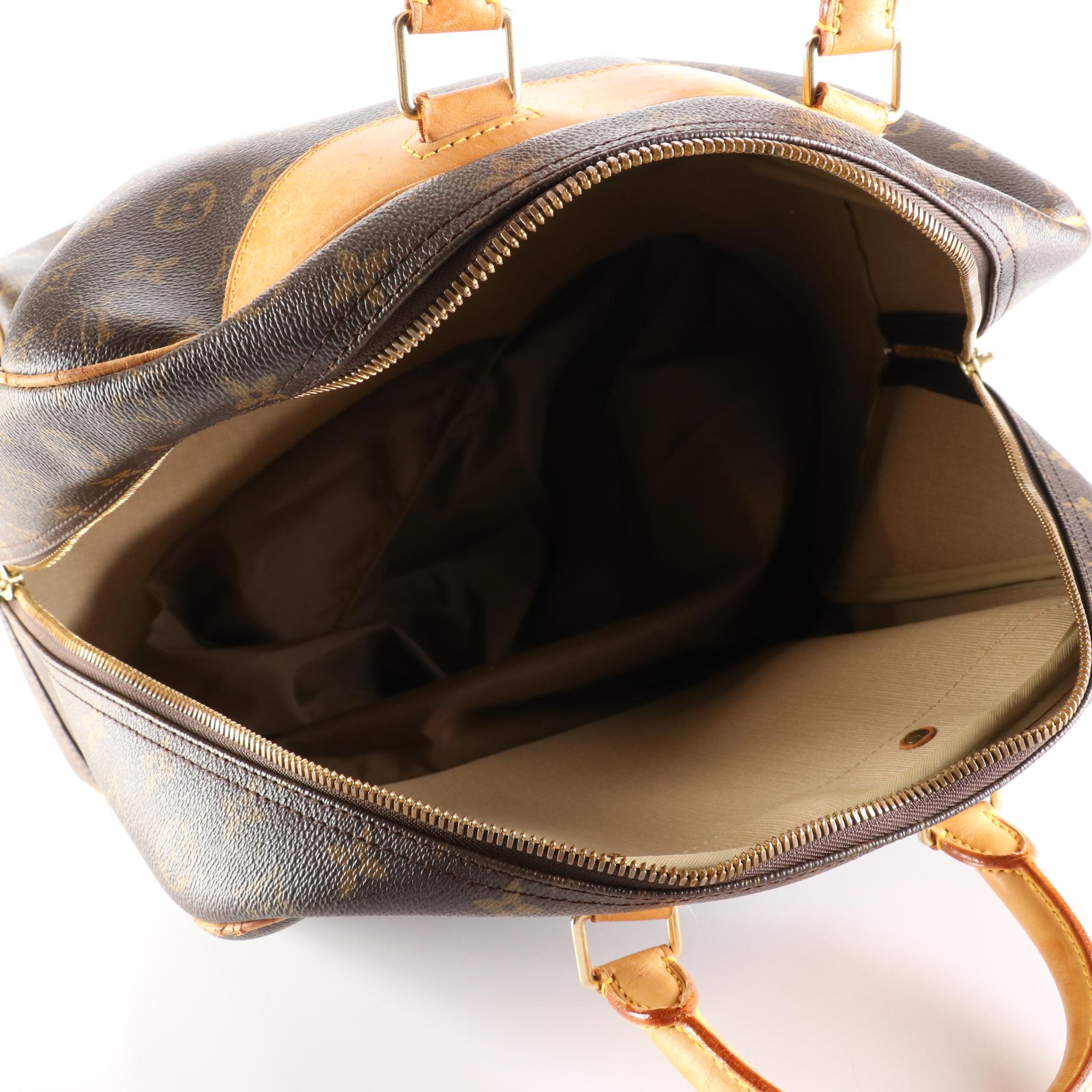 Louis Vuitton Evasion Travel Bag in Monogram Canvas and Vachetta