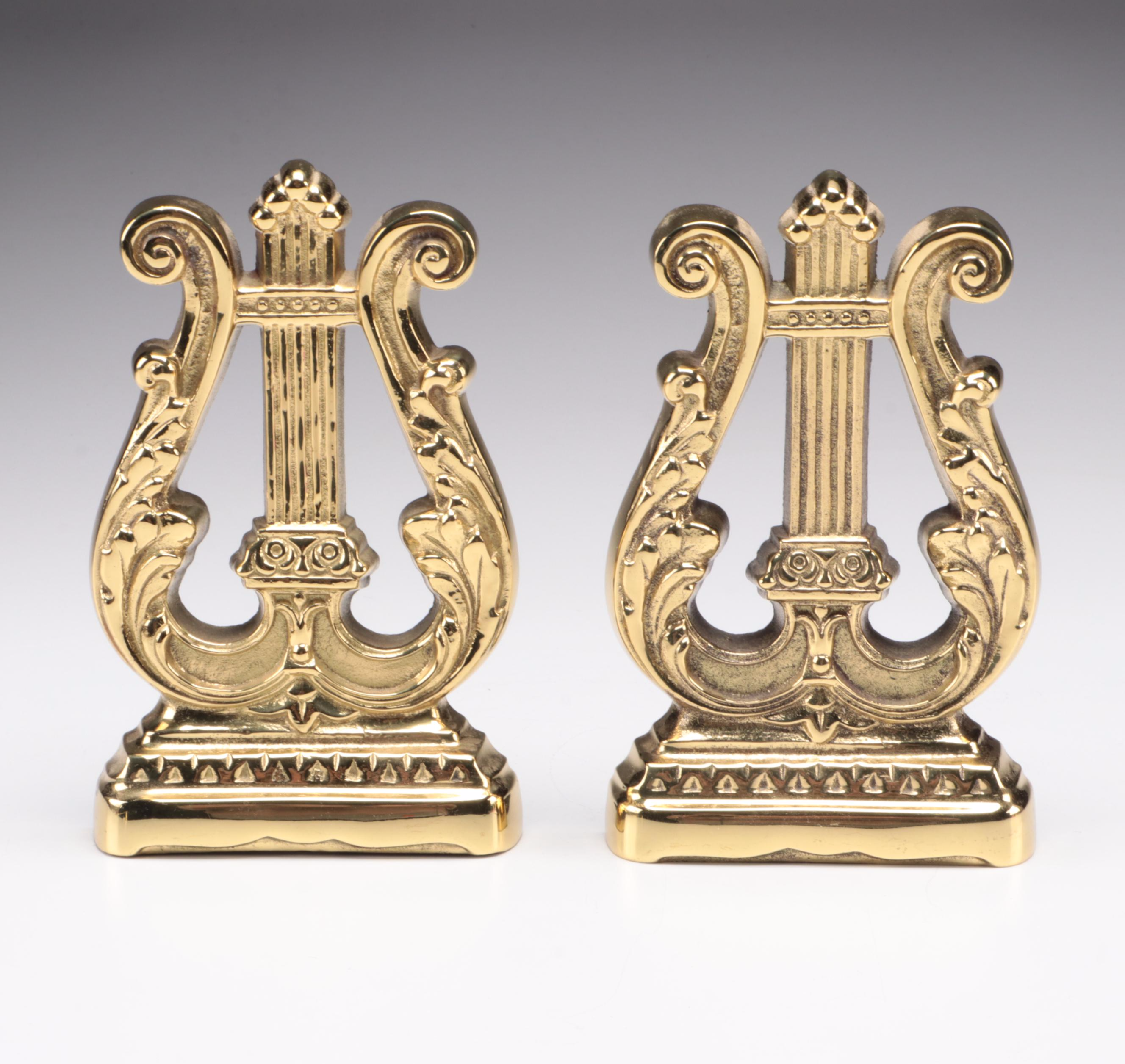 Lacquered Brass Bookends and Candlesticks EBTH