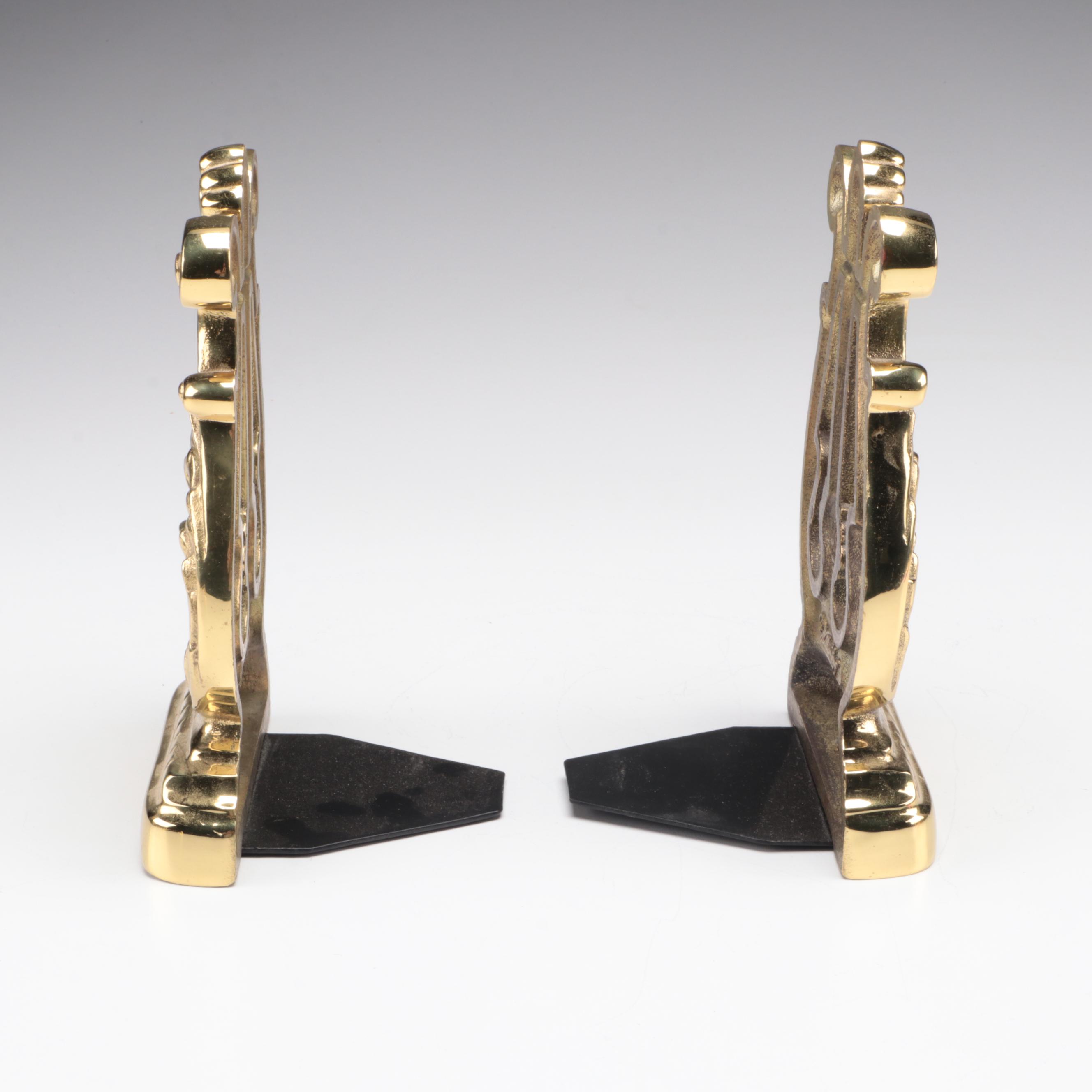 Lacquered Brass Bookends and Candlesticks EBTH