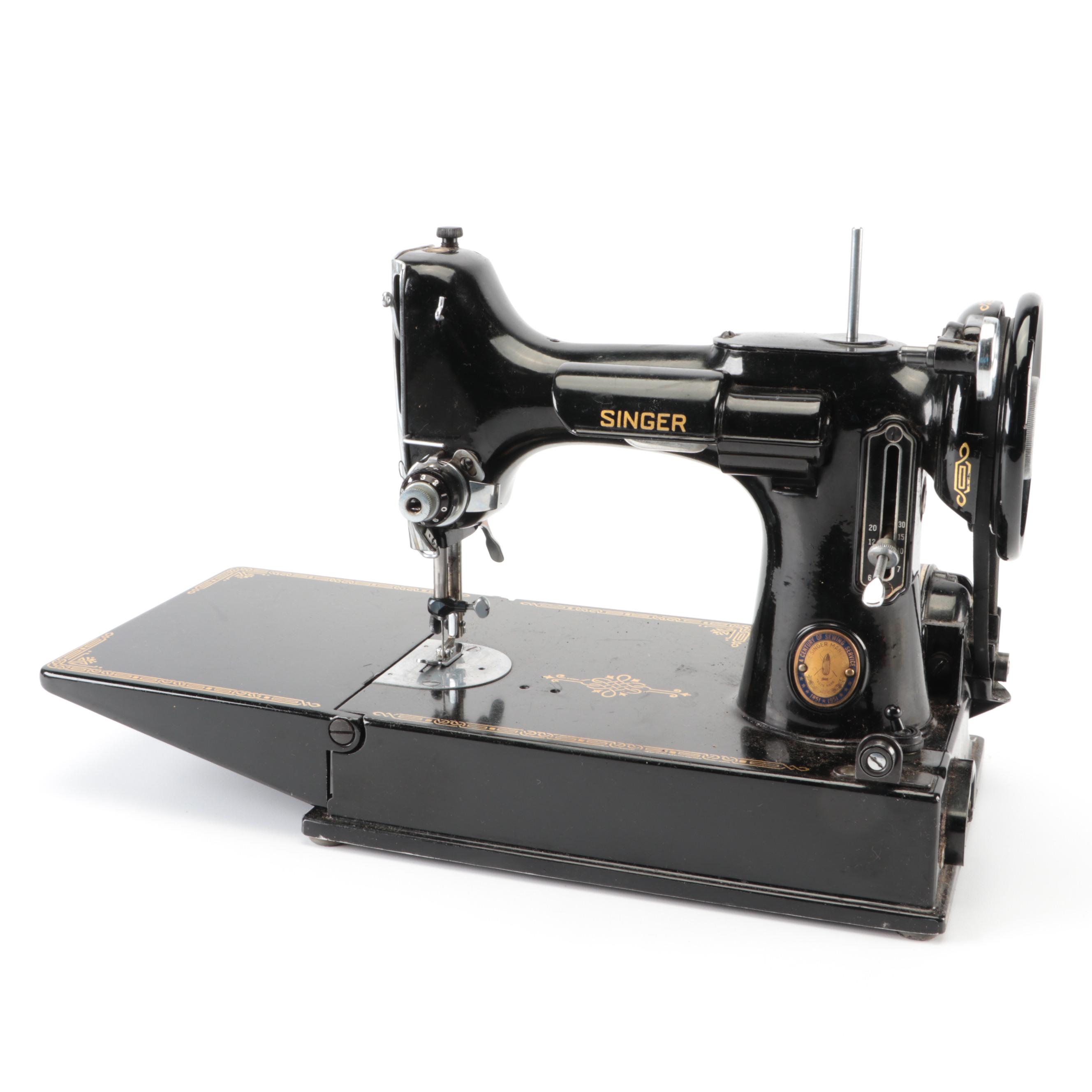 Singer Model 2211 Featherweight Sewing Machine With Case and Foot