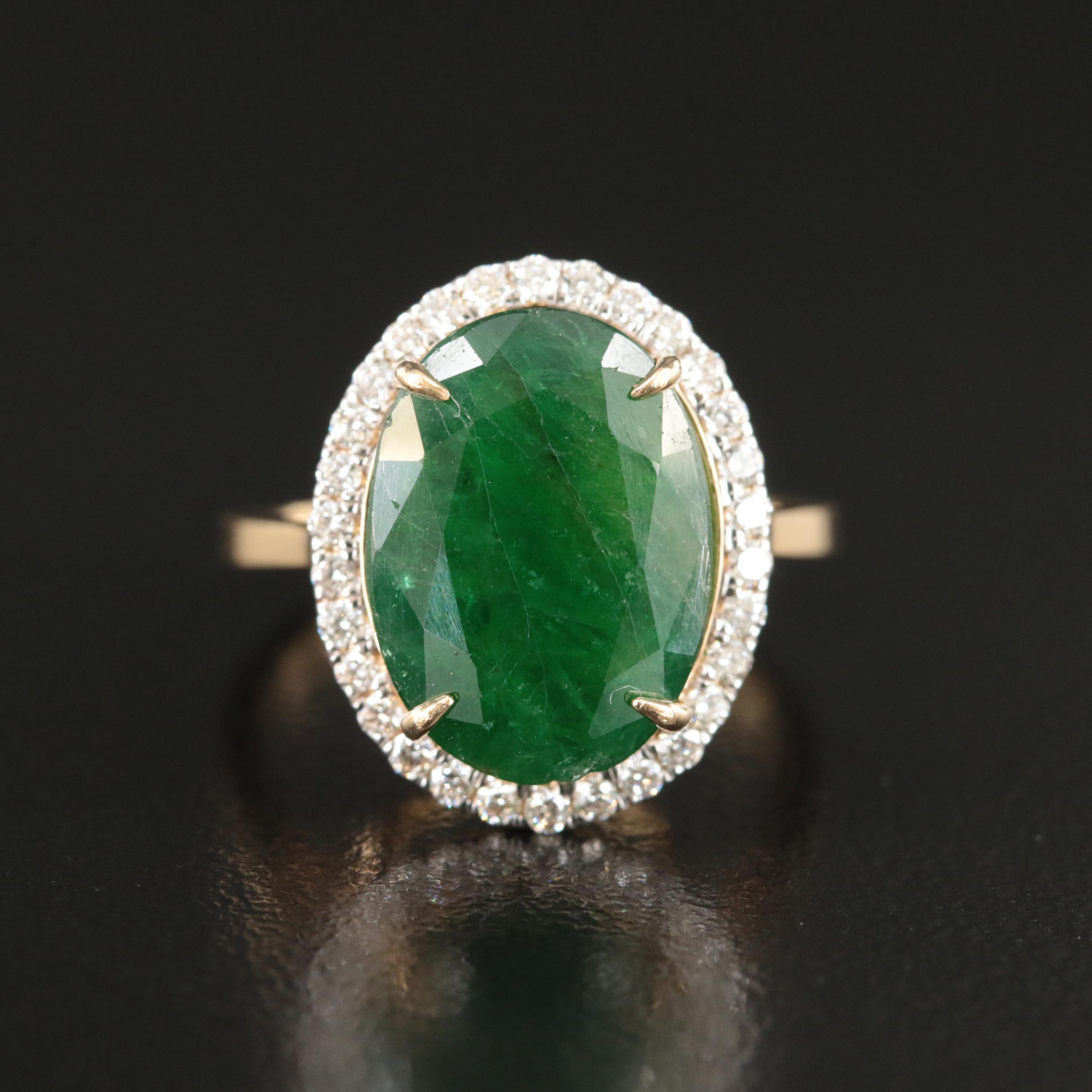 18K 5.56 CT Emerald and Diamond Halo Ring