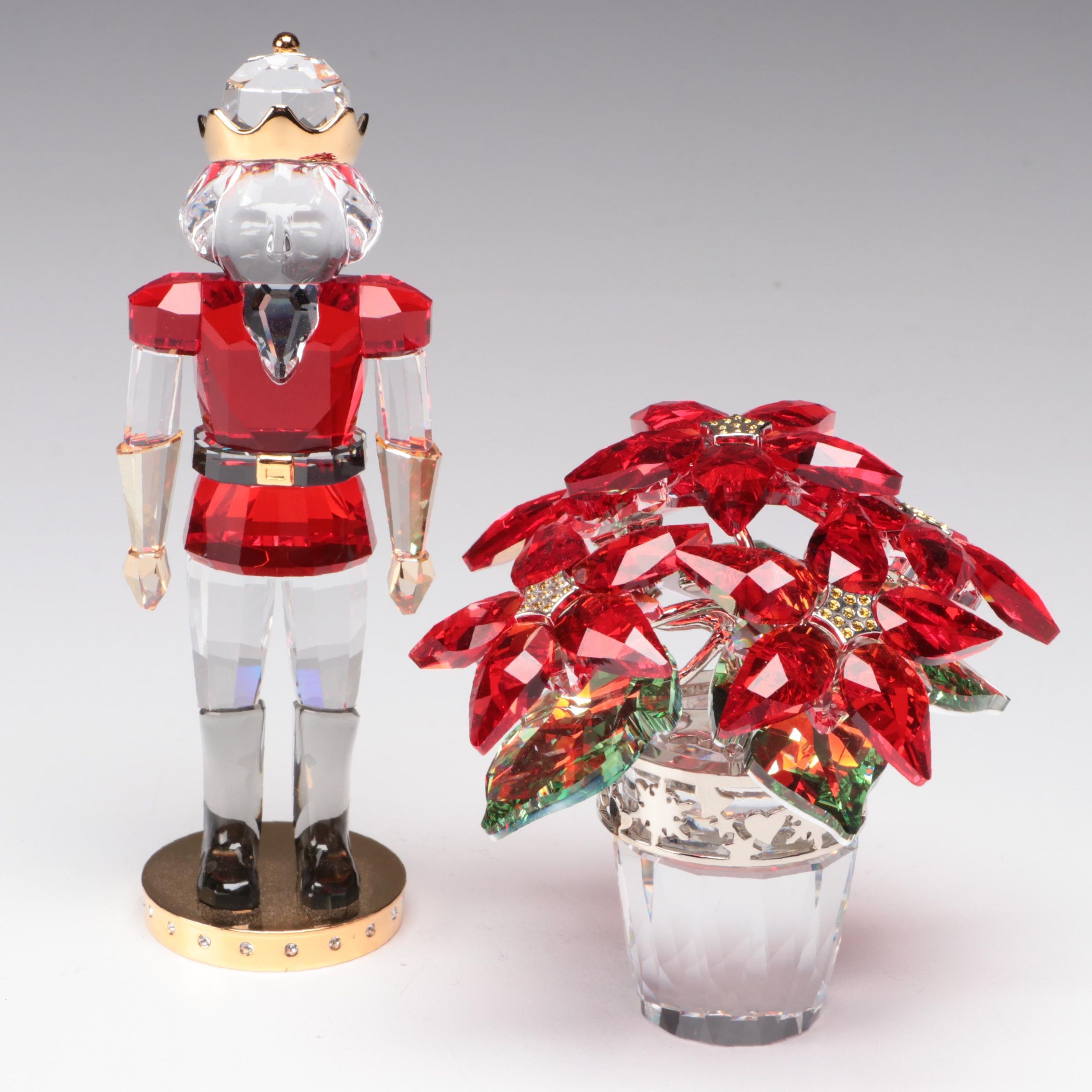 Swarovski Crystal Nutcracker and Poinsettia Figurines EBTH