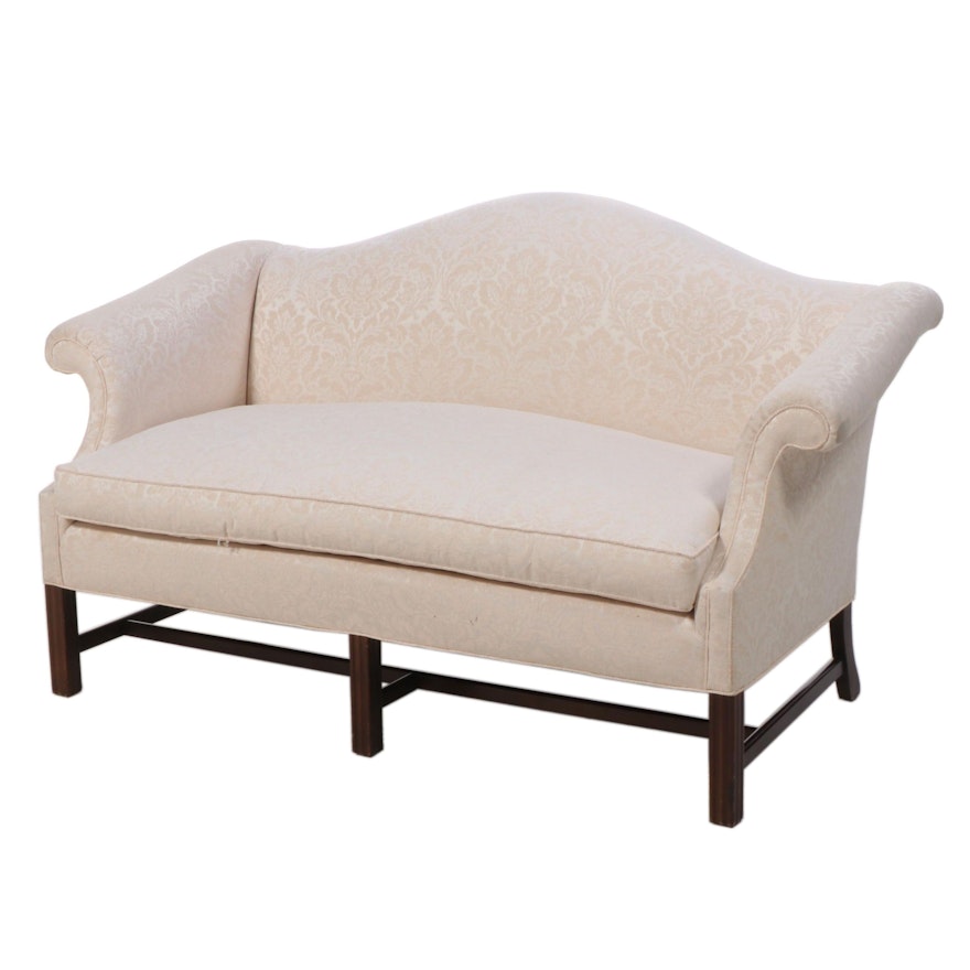 Chippendale Style Mahogany-Stained and Custom-Upholstered Camel-Back Loveseat